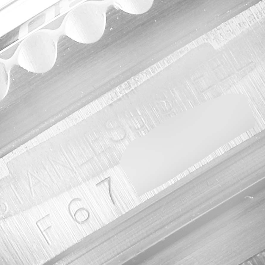 The image shows a close-up of the edge and engraving on the case of a Rolex Sea-Dweller 16600 Men
s Stainless Steel Black Dial 16600 Men
s Stainless Steel Black Dial watch.