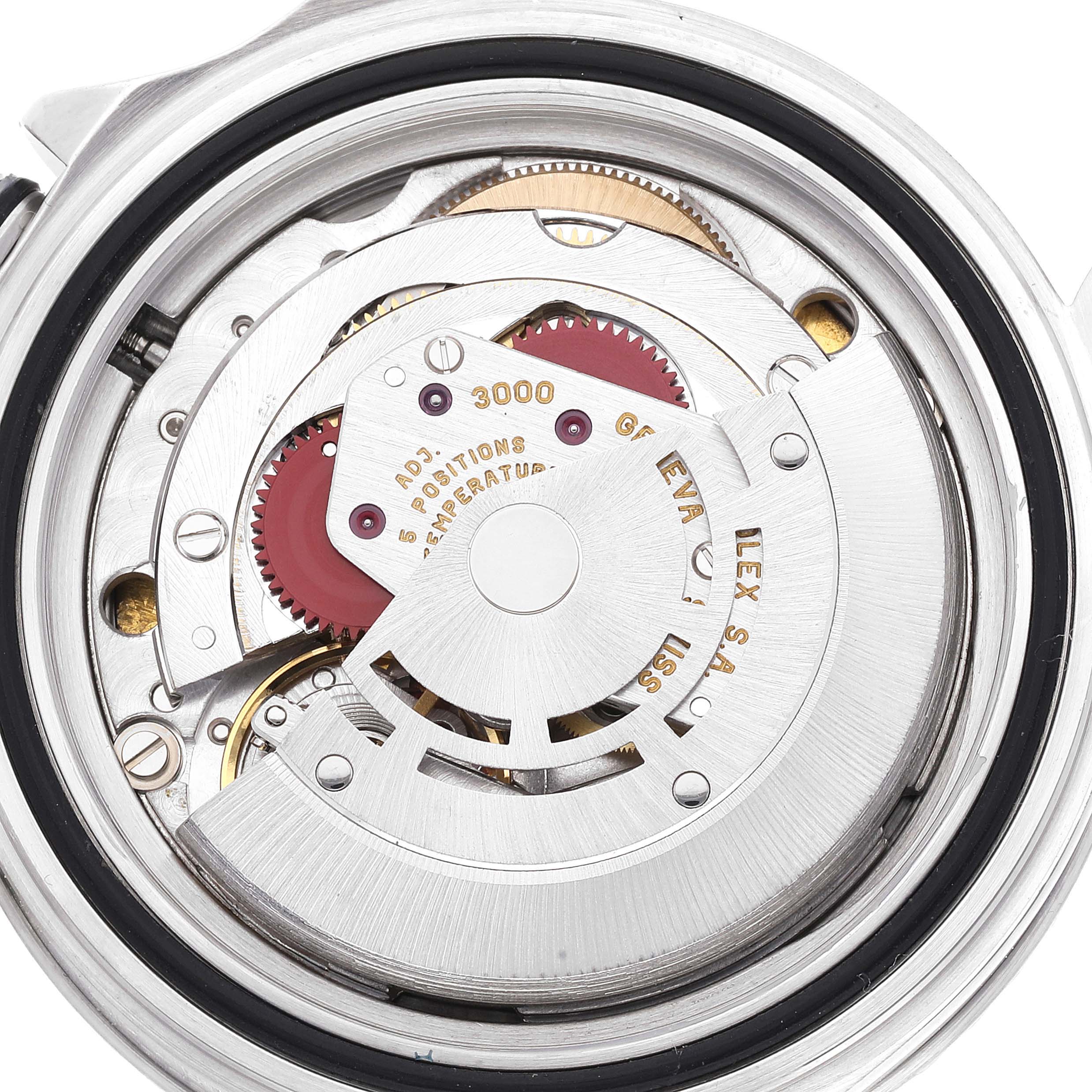 This image shows the internal movement mechanism of a Rolex Submariner 14060 Men
s Stainless Steel Black Dial 14060 Men
s Stainless Steel Black Dial watch from a top-down angle.