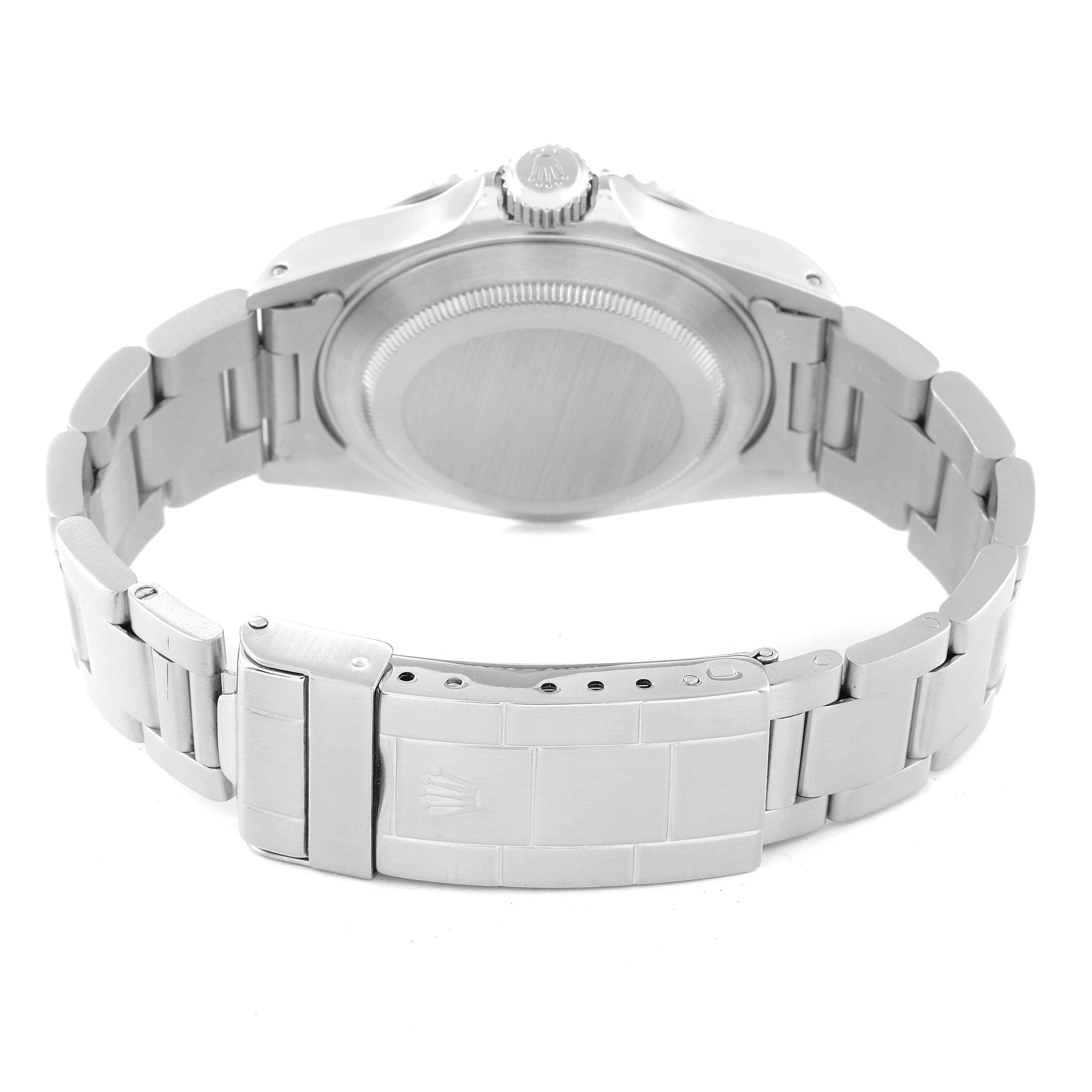 The image shows the back view of a Rolex Submariner 14060 Men
s Stainless Steel Black Dial 14060 Men
s Stainless Steel Black Dial, highlighting the case back and the bracelet with the clasp.