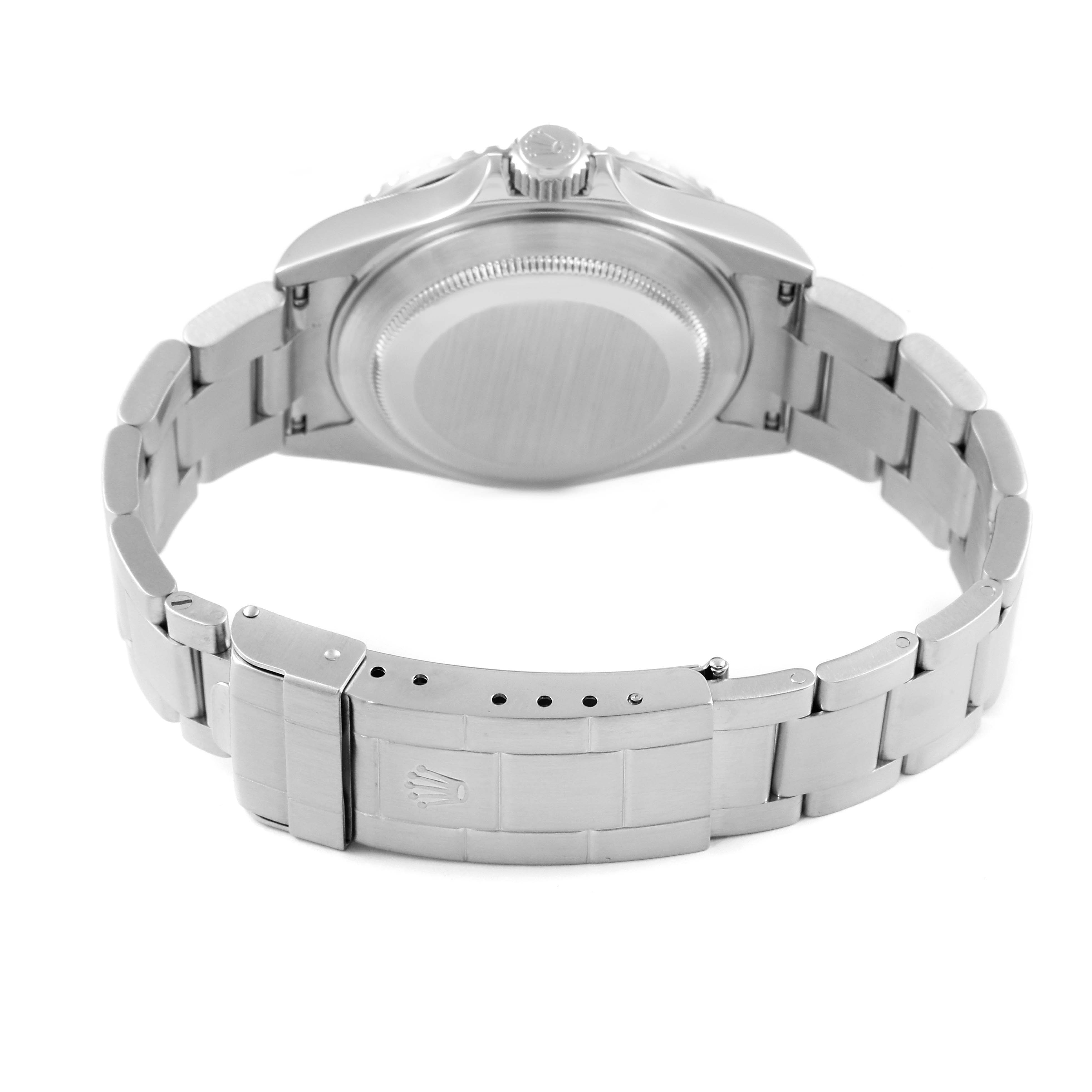 The image shows the back and bracelet clasp of a Rolex Submariner 16610 Men
s Stainless Steel Black Dial 16610 Men
s Stainless Steel Black Dial watch from a rear angle.