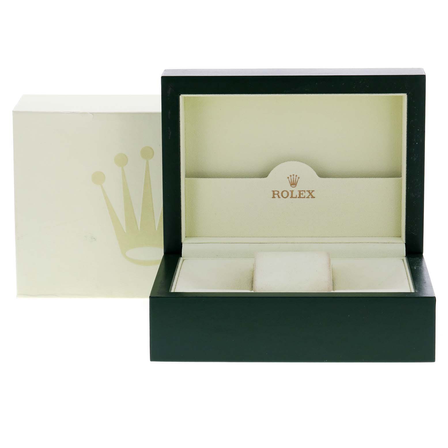 The image shows an open Rolex box for the Submariner model, highlighting the interior padding and the outer box with the Rolex logo.