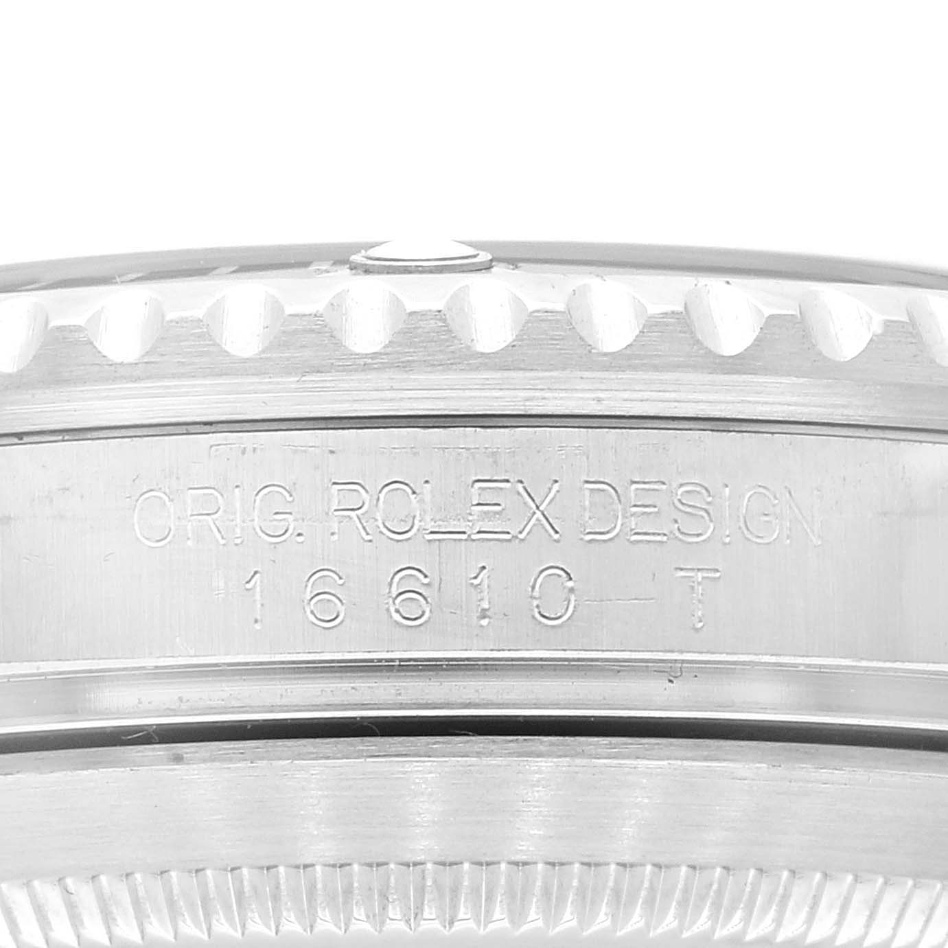 The image shows a close-up of the case side of the Rolex Submariner 16610 Men's Stainless Steel Black Dial 16610 Men's Stainless Steel Black Dial, with the model number 16610 engraved.