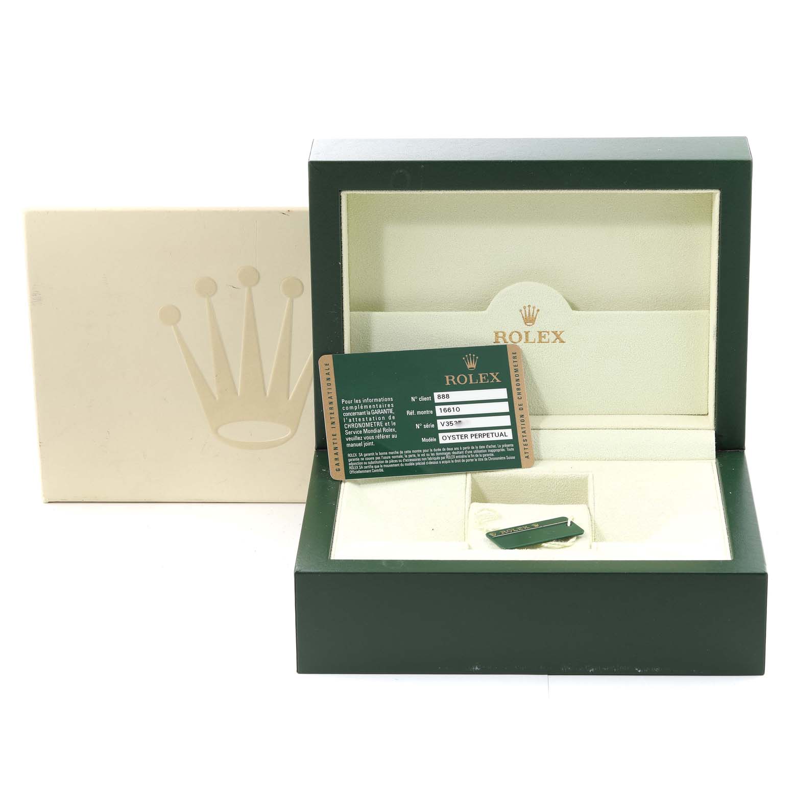 The image shows the open box of a Rolex Submariner 16610 Men's Stainless Steel Black Dial 16610 Men's Stainless Steel Black Dial watch, along with its warranty card and a hang tag.