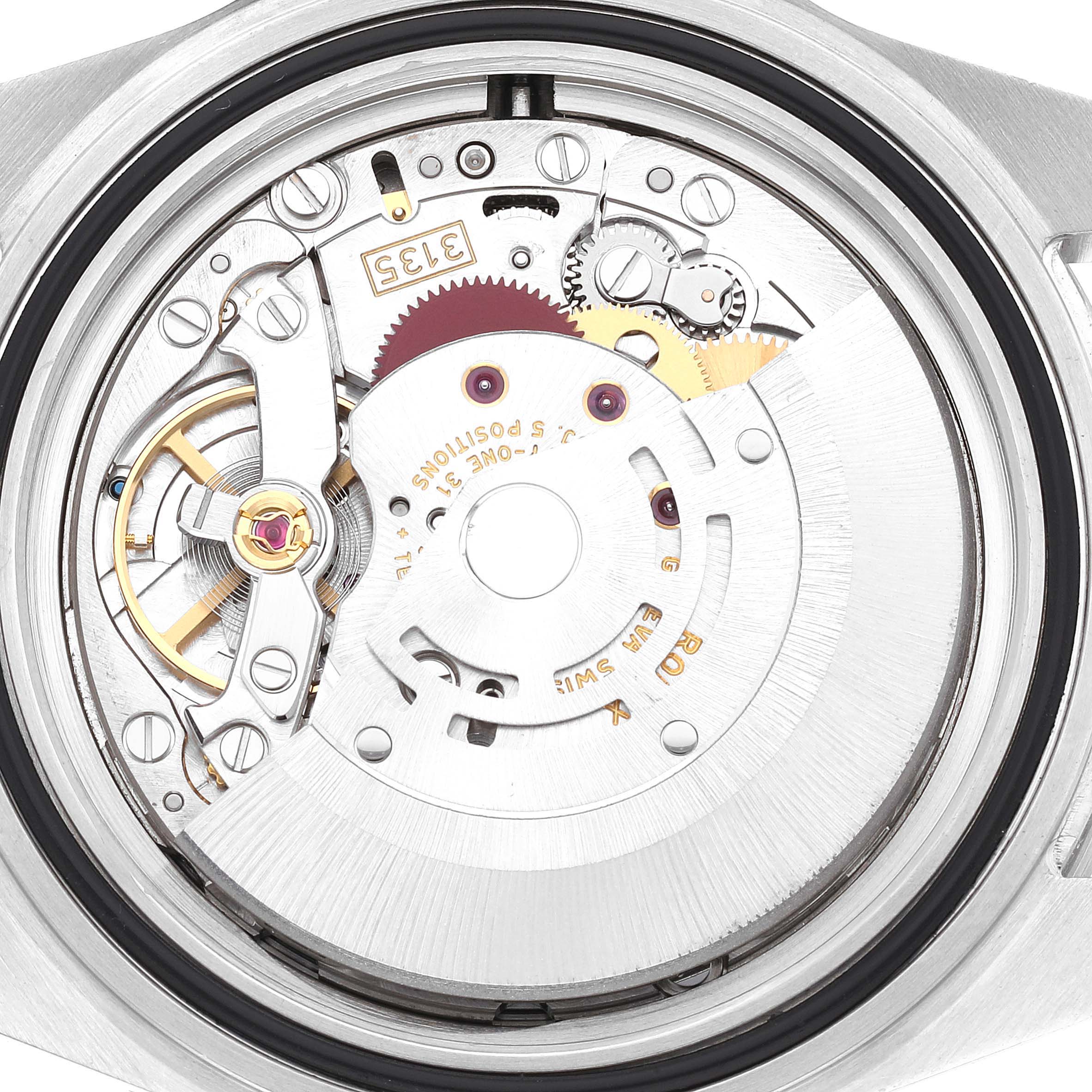 The image shows the Rolex Submariner 16610 Men's Stainless Steel Black Dial 16610 Men's Stainless Steel Black Dial's watch movement, viewed from the back, revealing its intricate internal mechanics.