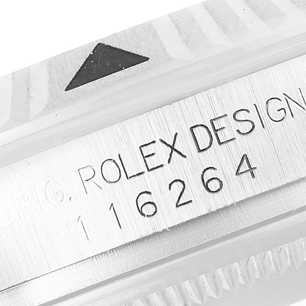 This close-up image shows the engraved details on the side of a Rolex Turn-o-Graph 116264 Men
s Stainless Steel White Dial 116264 Men
s Stainless Steel White Dial watch, featuring the bezel and model number.
