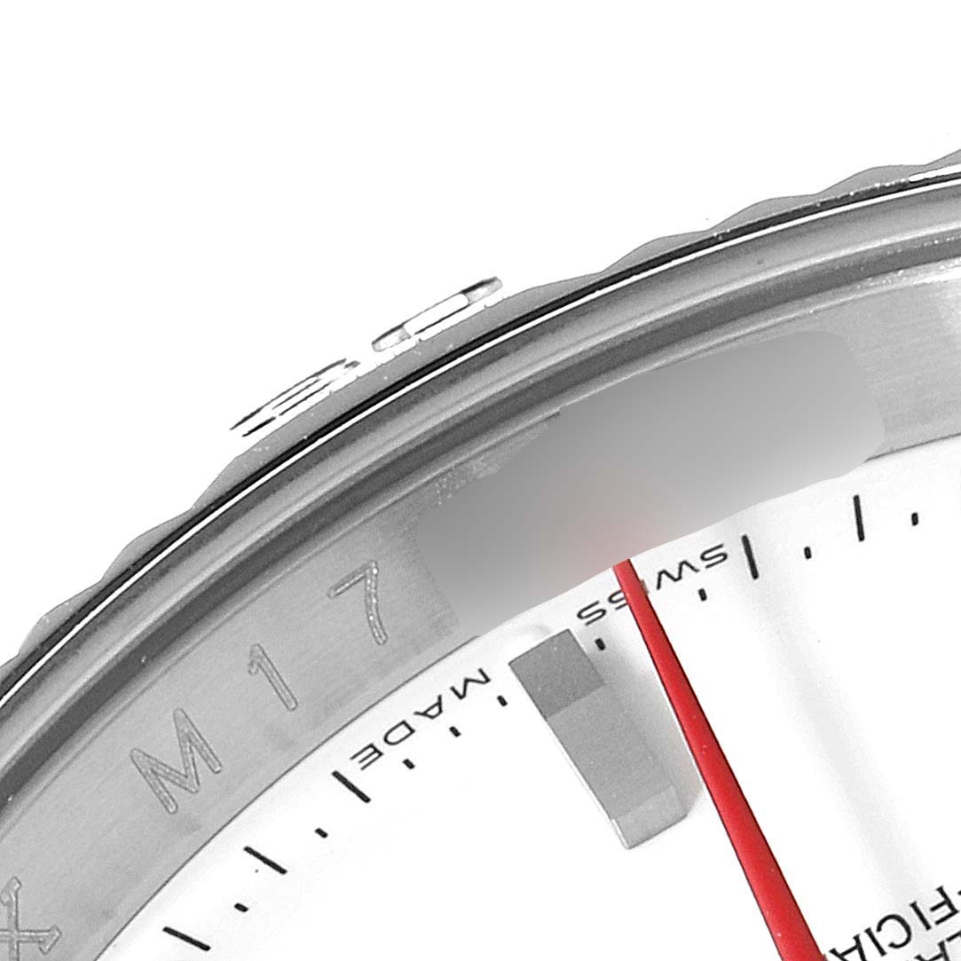 This image shows a close-up of the bezel, part of the dial, and the minute hand of the Rolex Turn-o-Graph 116264 Men
s Stainless Steel White Dial 116264 Men
s Stainless Steel White Dial watch.