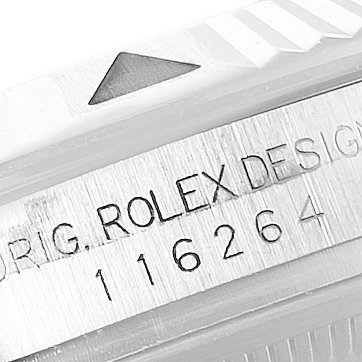The image shows a close-up of the bezel and serial number engraving on a Rolex Turn-o-Graph 116264 Men
s Stainless Steel White Dial 116264 Men
s Stainless Steel White Dial watch.