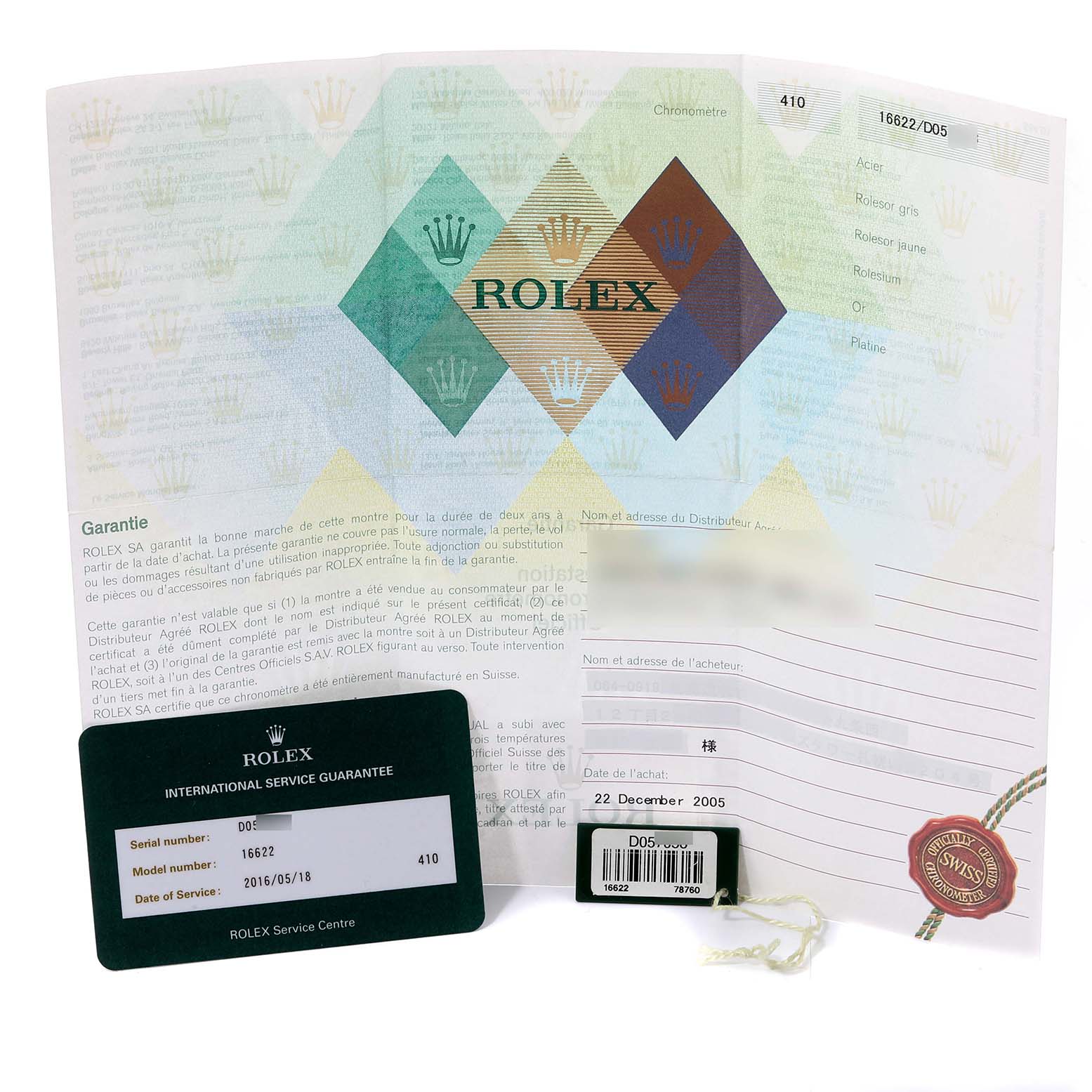 The image shows the international service guarantee card, warranty booklet, and tags for the Rolex Yacht-Master 16622 Men's Stainless Steel Silver Dial 16622 Men's Stainless Steel Silver Dial model.