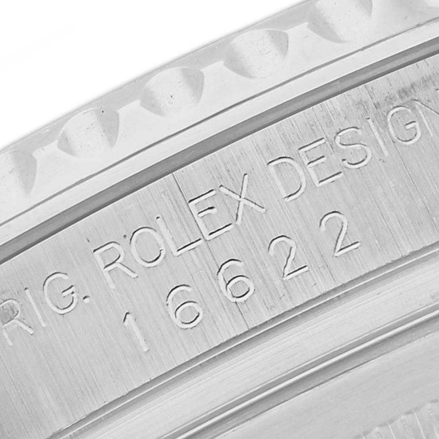 This close-up image shows the engraved reference numbers on the case of the Rolex Yacht-Master 16622 Men's Stainless Steel Silver Dial 16622 Men's Stainless Steel Silver Dial watch.
