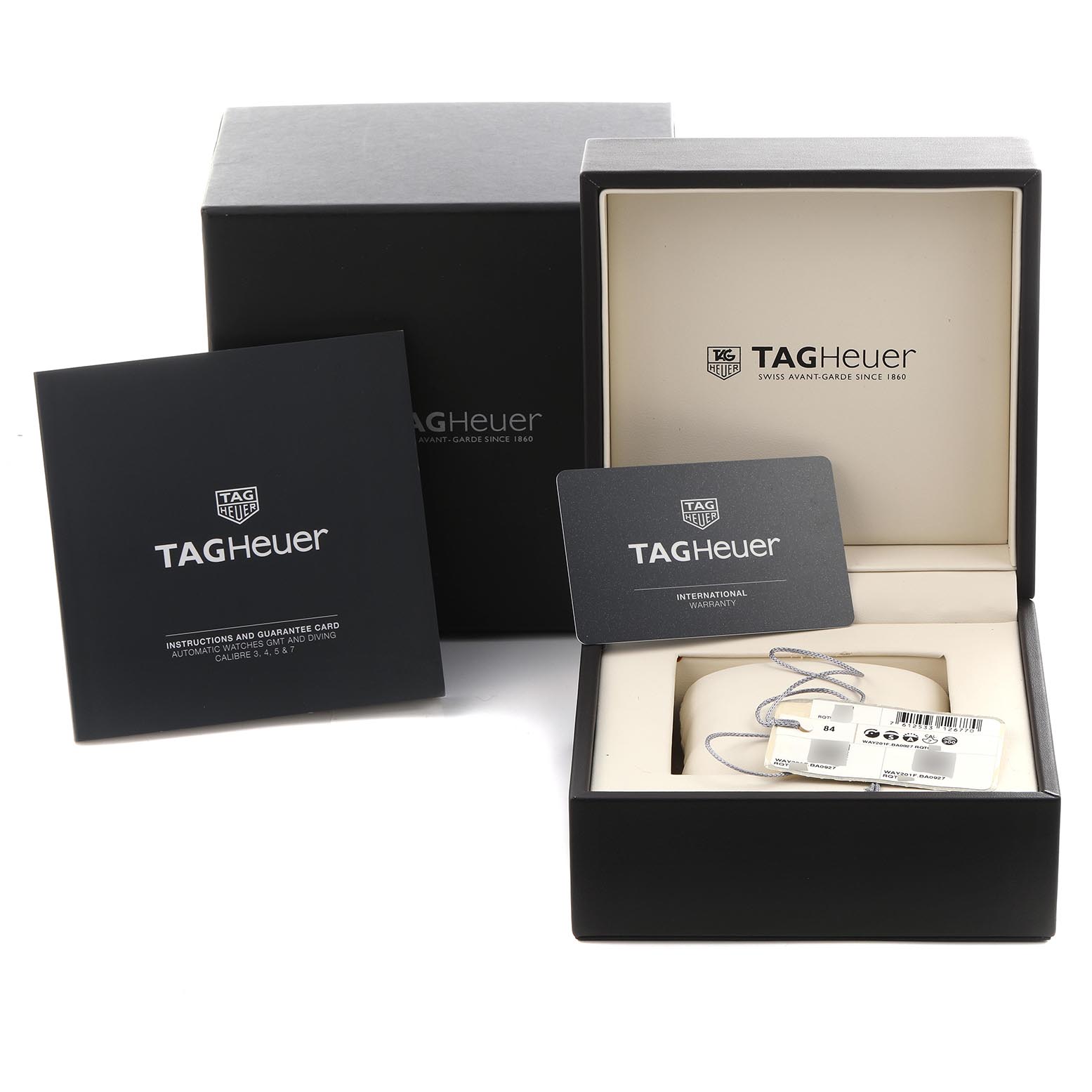 The image shows a Tag Heuer Aquaracer WAY201F.BA0927 Men
s Stainless Steel Black Dial WAY201F.BA0927 Men
s Stainless Steel Black Dial watch box at a front angle, with the warranty card, manual, and tags displayed.