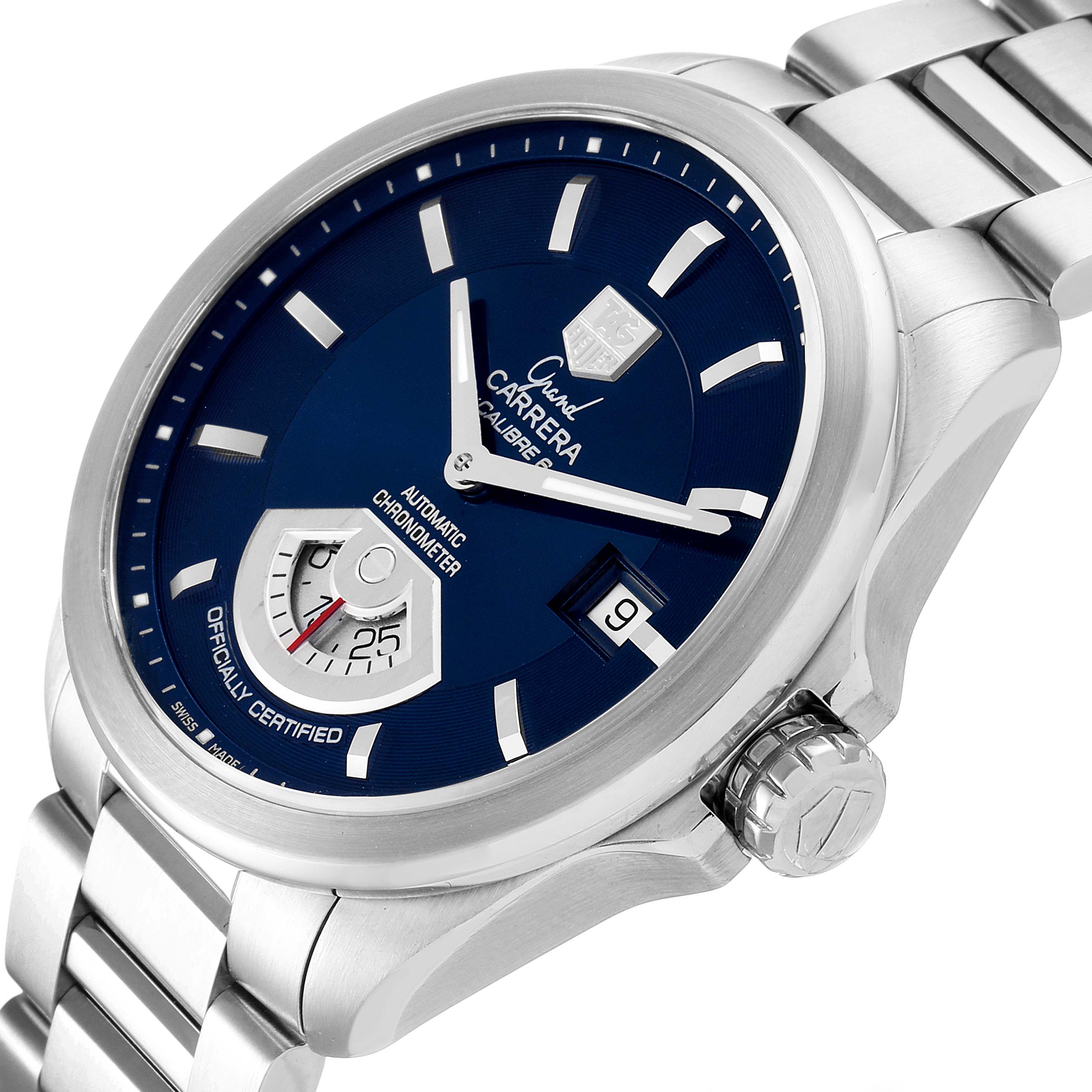 The image shows a close-up angle of the Tag Heuer Carrera WAV511J.BA0900 Men
s Stainless Steel Blue Dial WAV511J.BA0900 Men
s Stainless Steel Blue Dial watch, highlighting the dial, crown, and part of the metal bracelet.