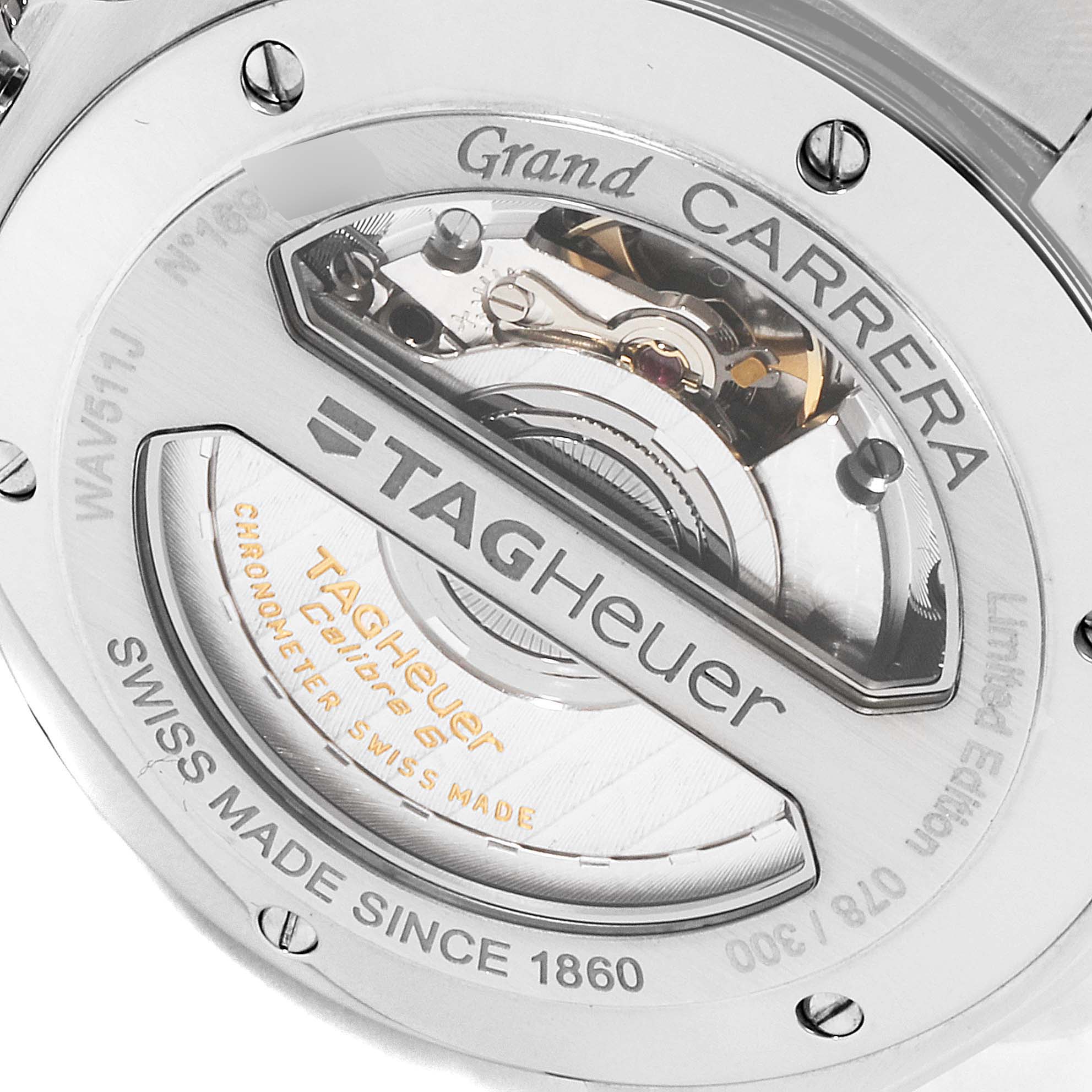 This image shows the backside of the Tag Heuer Carrera WAV511J.BA0900 Men
s Stainless Steel Blue Dial WAV511J.BA0900 Men
s Stainless Steel Blue Dial watch, highlighting its internal mechanisms and branding.