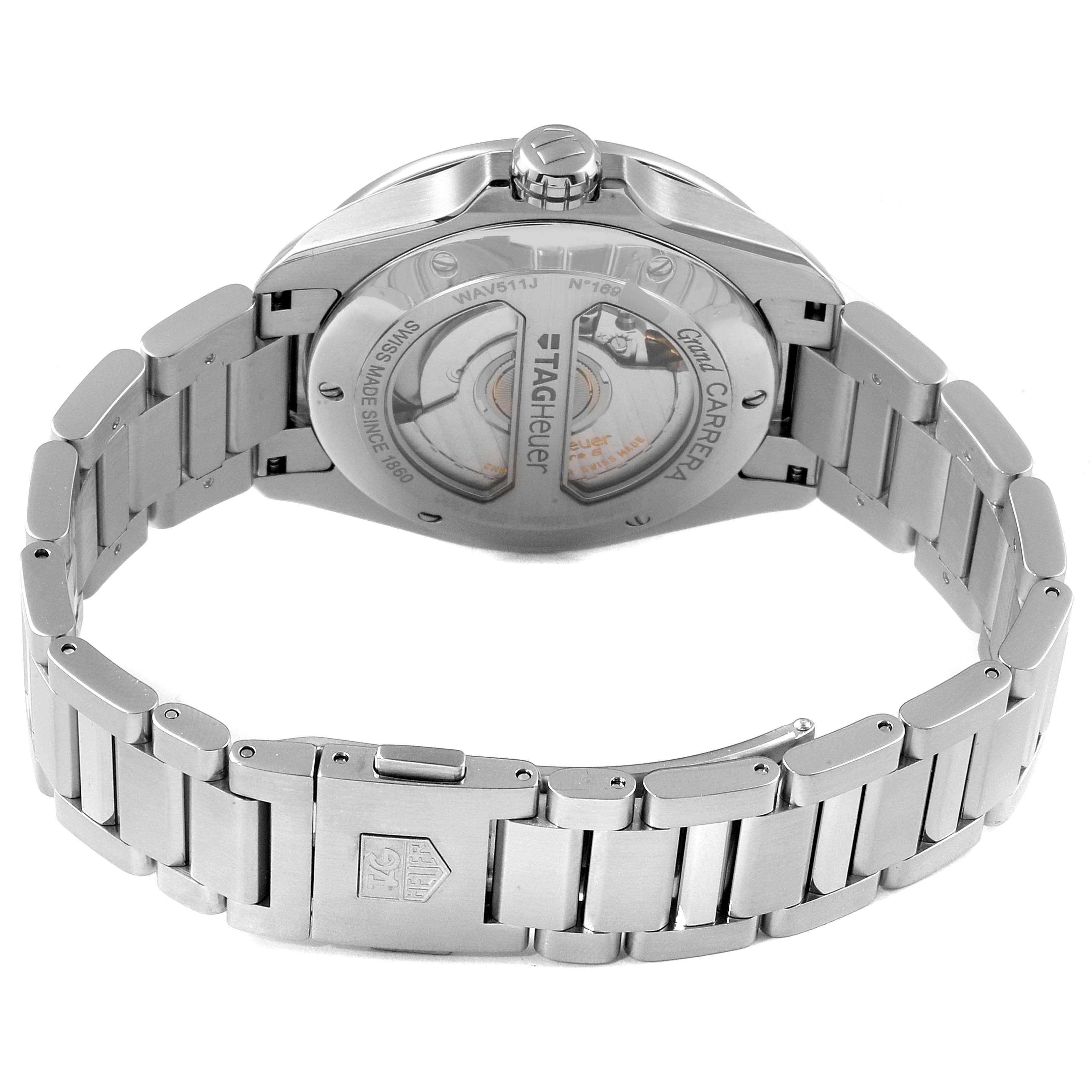 The image shows the back view of a Tag Heuer Carrera WAV511J.BA0900 Men
s Stainless Steel Blue Dial WAV511J.BA0900 Men
s Stainless Steel Blue Dial watch, highlighting its open case back and metal bracelet.