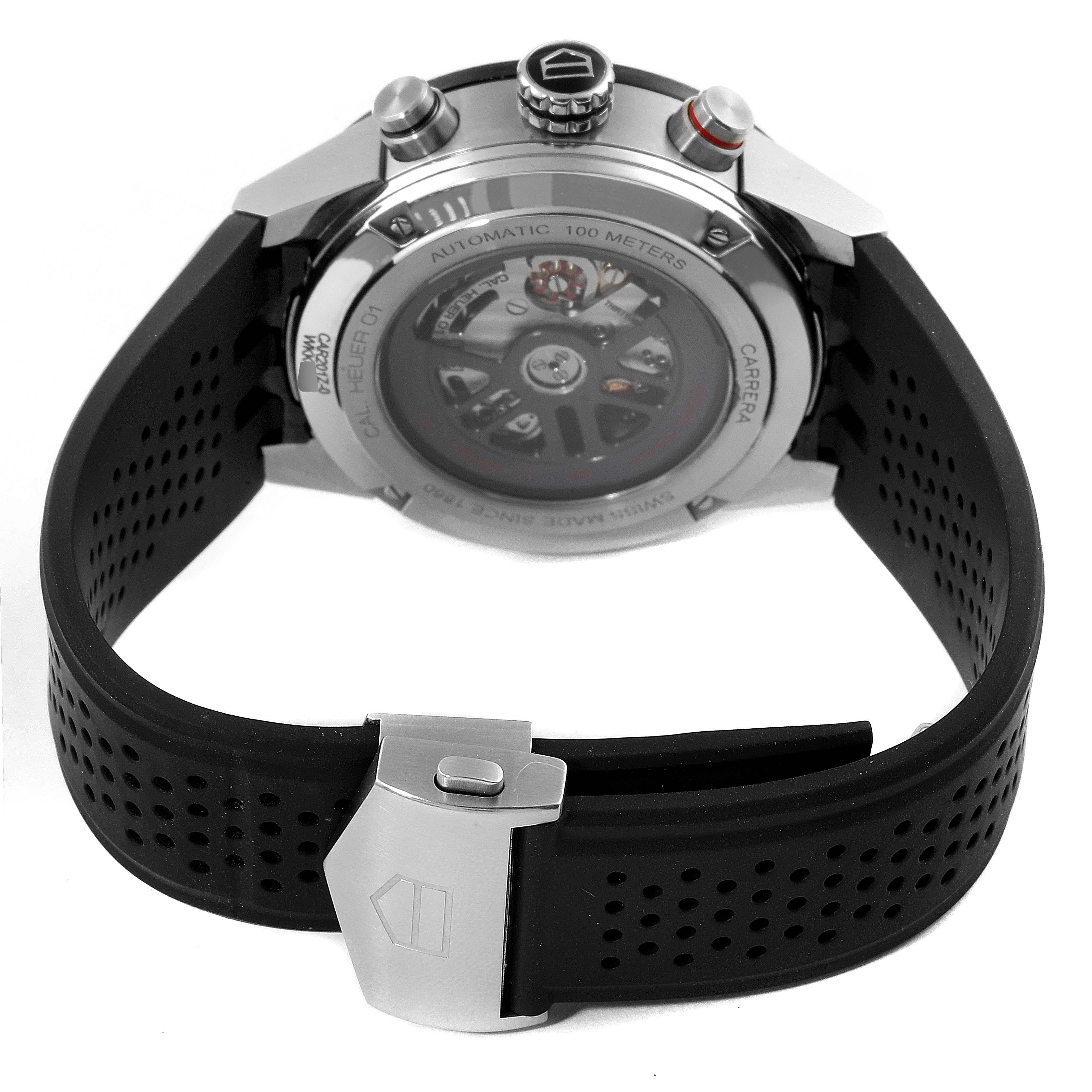 The image shows the back and side view of a Tag Heuer Carrera CAR201Z.BA0714 Men
s Stainless Steel Black Dial CAR201Z.BA0714 Men
s Stainless Steel Black Dial watch, highlighting its automatic movement and black perforated strap.
