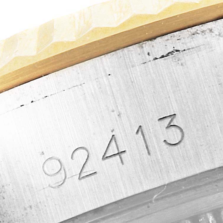 This image shows the serial number engraving on the side of the bezel of the Tudor Princess 92413 Women's Steel and Gold (two tone) Champagne Dial 92413 Women's Steel and Gold (two tone) Champagne Dial watch.