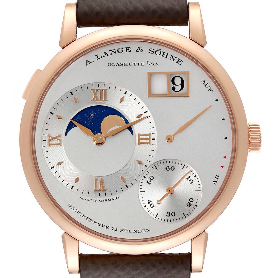 The Lange 1 by A. Lange & Söhne is shown from the front, featuring the dial, moon phase, date display, and power reserve.