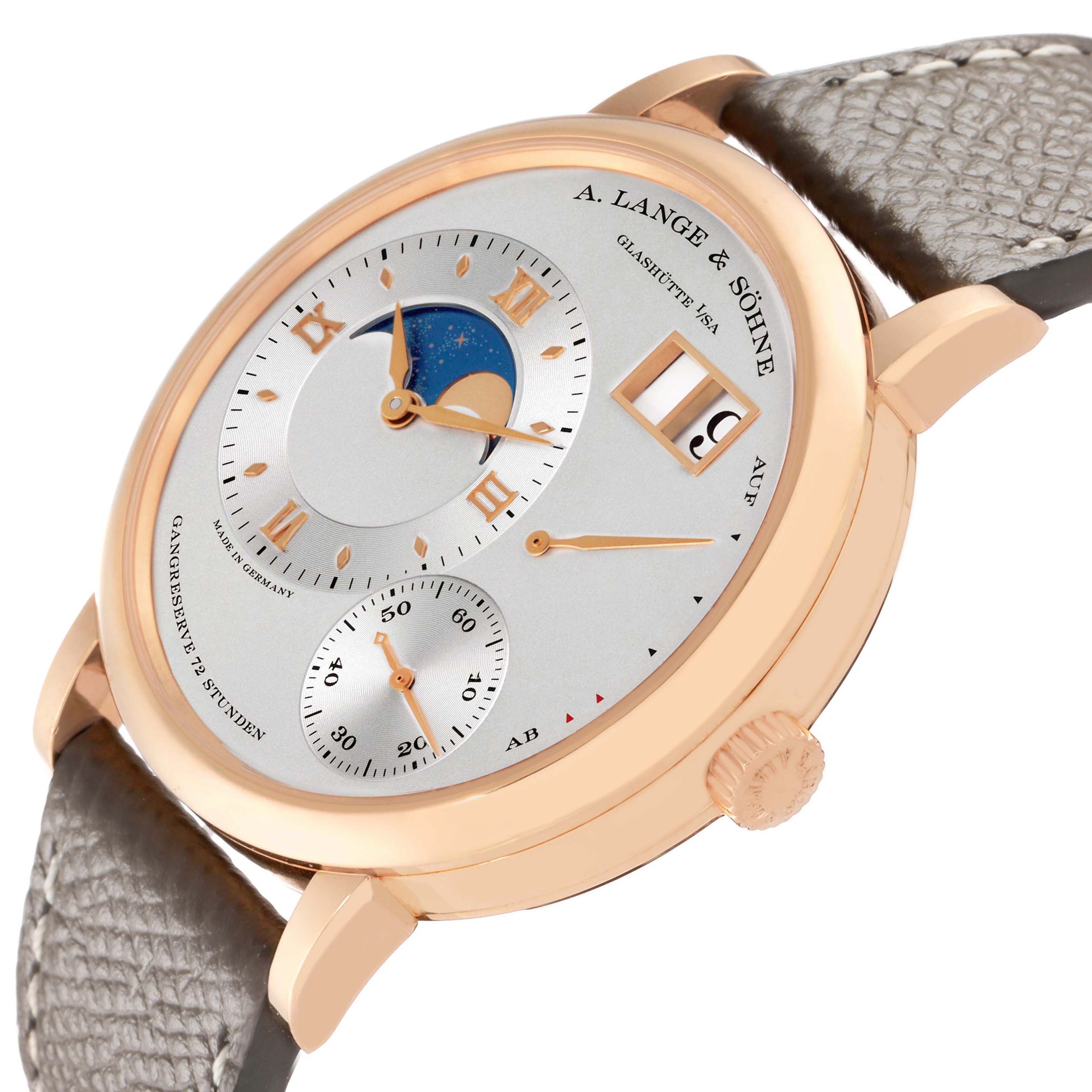The image shows a side-angle view of the A. Lange & Sohne Lange 1 139.032 Men's Rose Gold Silver Dial watch, displaying the face, moon phase, and crown.