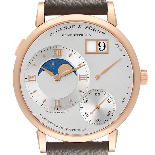 The A. Lange & Sohne Lange 1 139.032 Men's Rose Gold Silver Dial watch is shown from a front angle, displaying the dial, moon phase, power reserve, and date window.