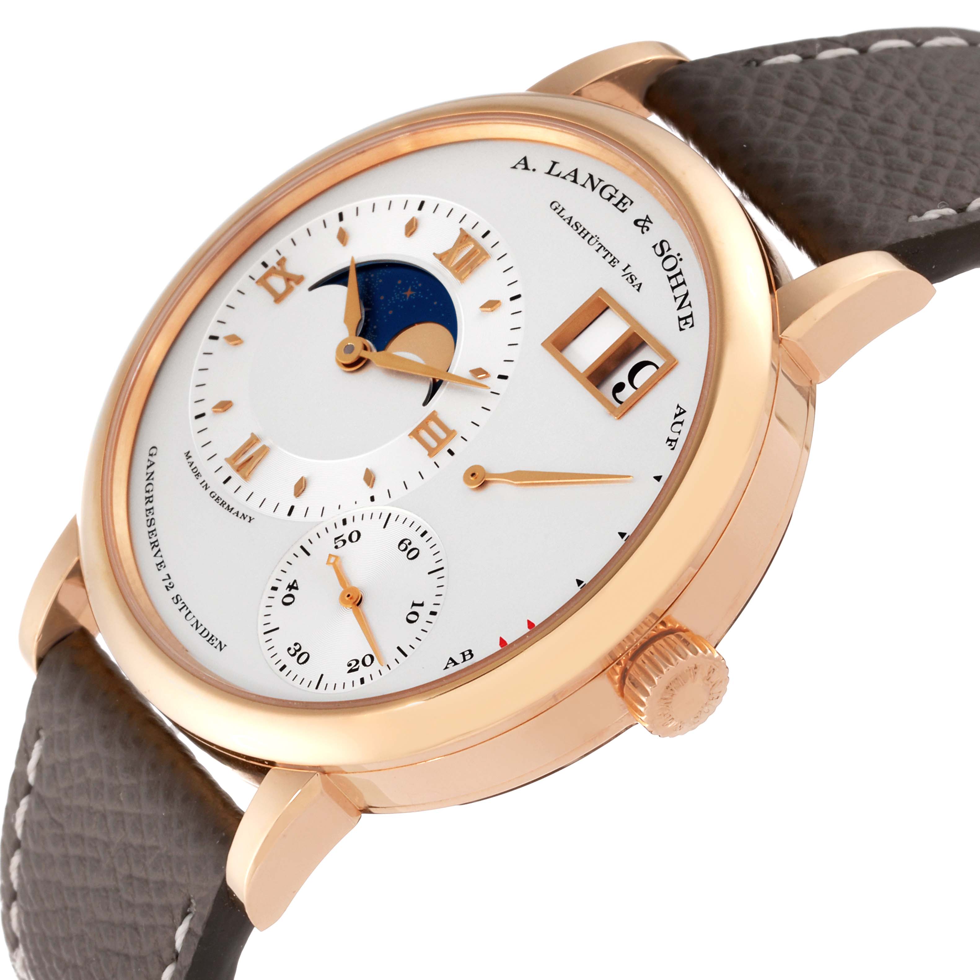 This image shows a Lange 1 model watch by A. Lange 
Söhne at an angled view, highlighting its dial, case, and crown.