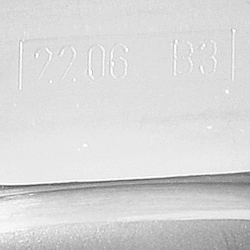 The image shows a close-up of the engravings on the clasp of a Breitling Bentley A44362 Men's Stainless Steel Brown Dial A44362 Men's Stainless Steel Brown Dial model watch.