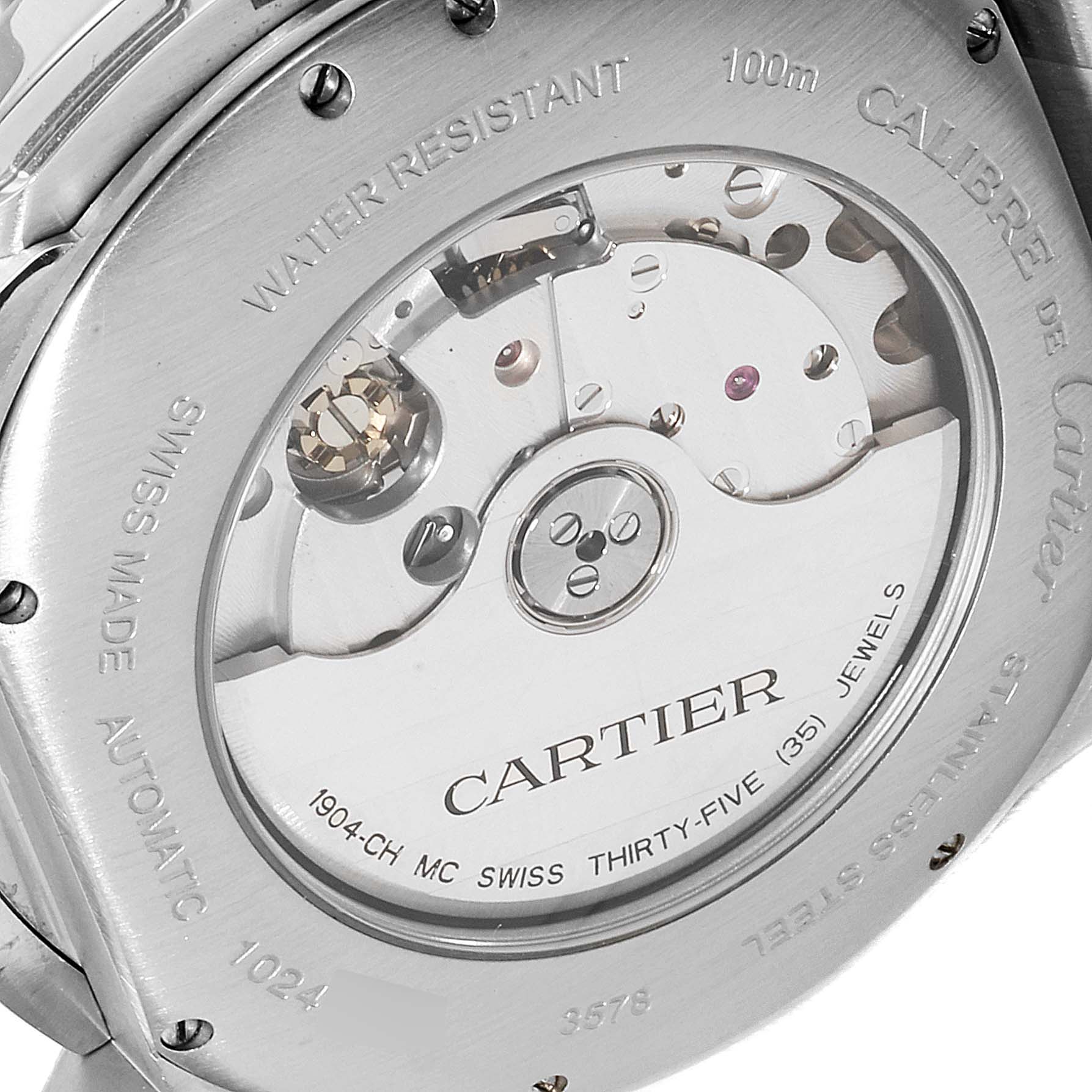 The image shows the back case and internal mechanism of a Calibre de Cartier watch by Cartier.