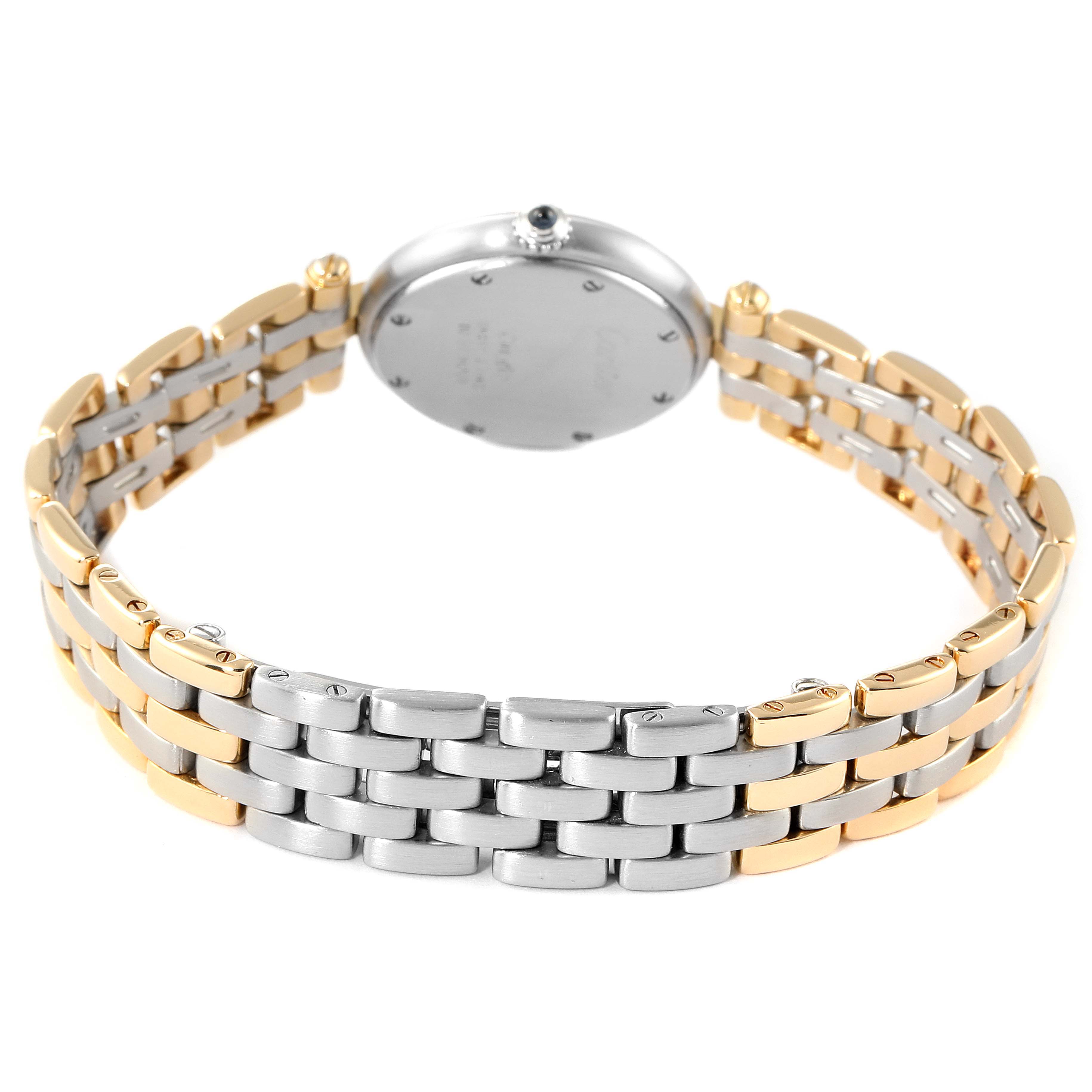 The image shows a rear view of a Panthère de Cartier watch, highlighting its two-tone bracelet and case back.
