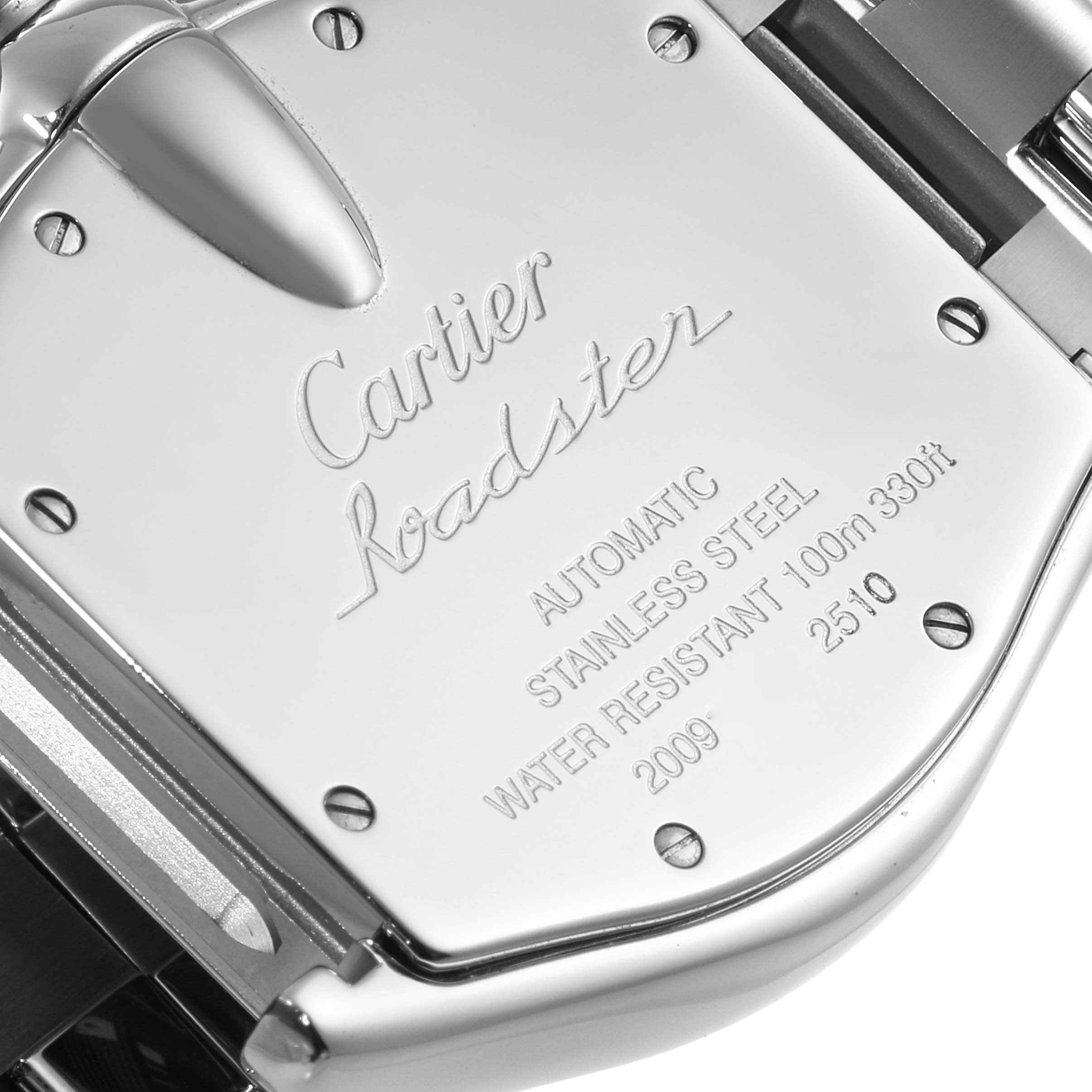 This image shows the back case of a Cartier Roadster W62002V3 Men's Stainless Steel Black Dial W62002V3 Men's Stainless Steel Black Dial watch, highlighting its engraved details and screws.