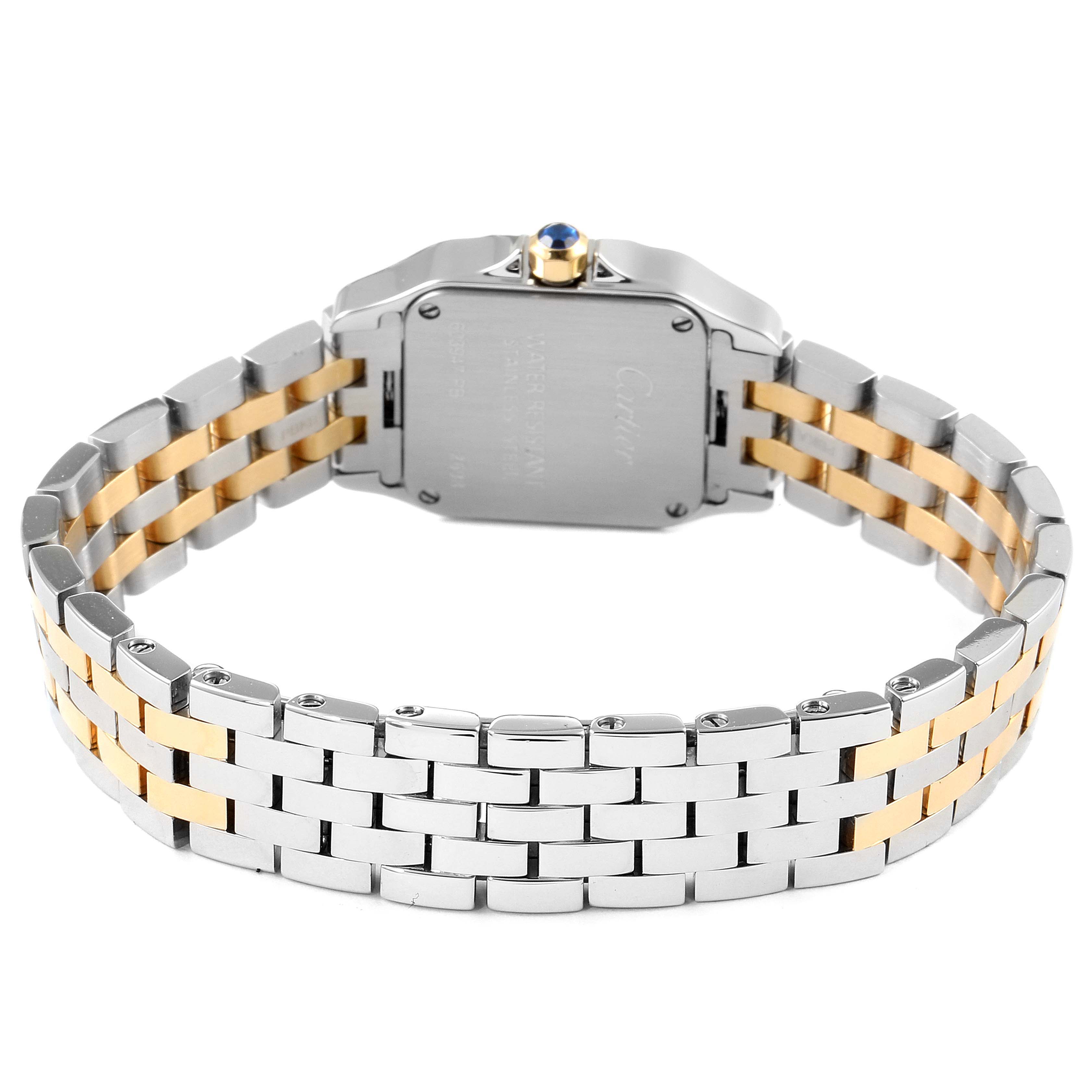 The image shows the rear view of a Cartier Santos Demoiselle W25066Z6 Women
s Steel and Gold (two tone) Silver Dial W25066Z6 Women
s Steel and Gold (two tone) Silver Dial watch, highlighting its stainless steel and gold bracelet.