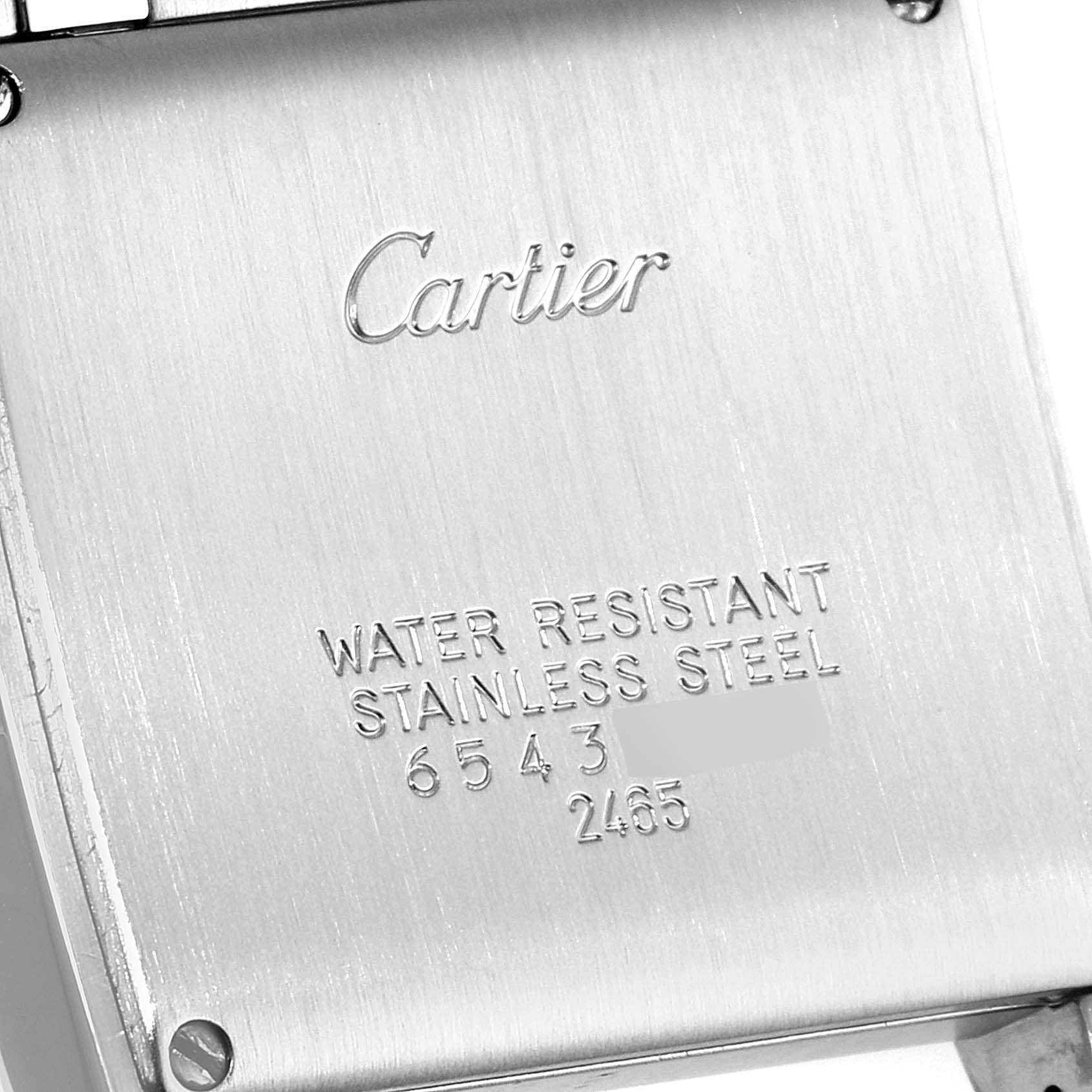 The image shows the case back of a Cartier Tank Française watch, emphasizing the brand and model details.