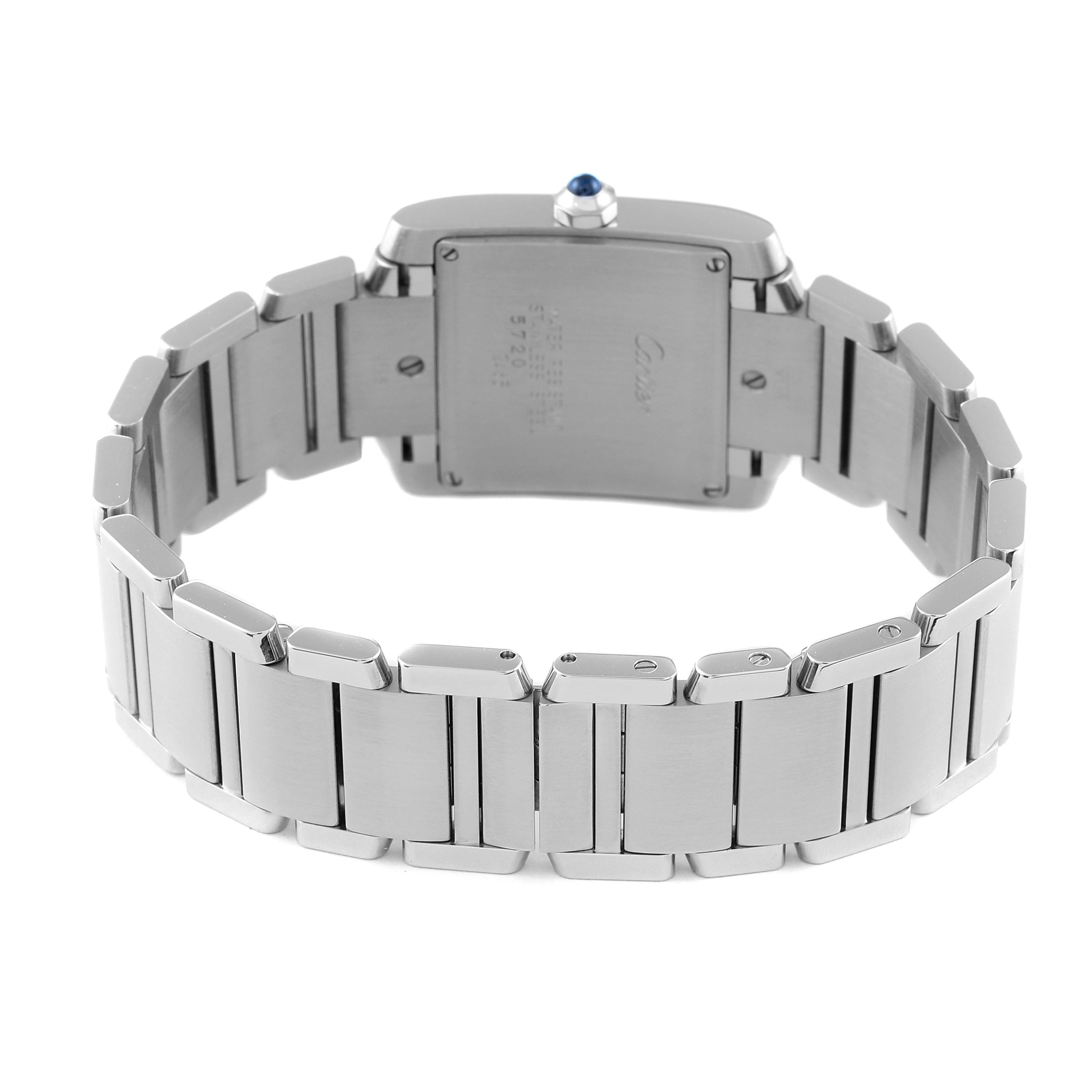 The image shows the backside and bracelet of a Cartier Tank Française watch.