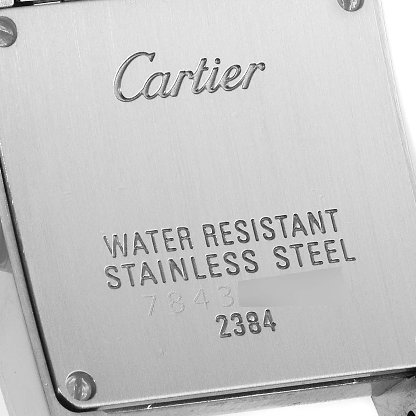 This image shows the back case of a Cartier Tank Francaise W51028Q3 Women
s Stainless Steel Mother of Pearl Dial W51028Q3 Women
s Stainless Steel Mother of Pearl Dial watch, highlighting its water resistance and stainless steel material.