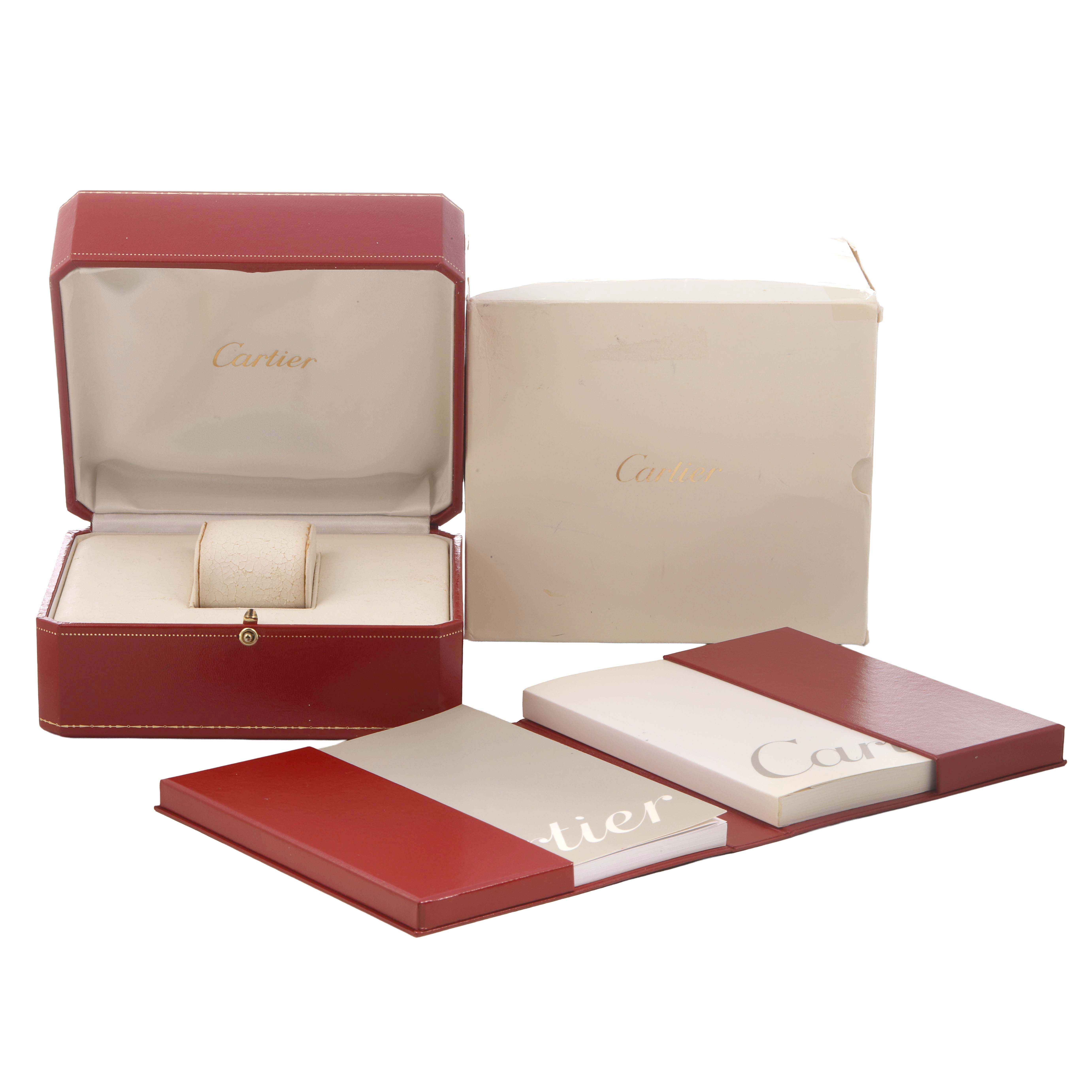 The image shows a Cartier Tank Française watch box and accessories, including an open red box, outer box, and booklets.
