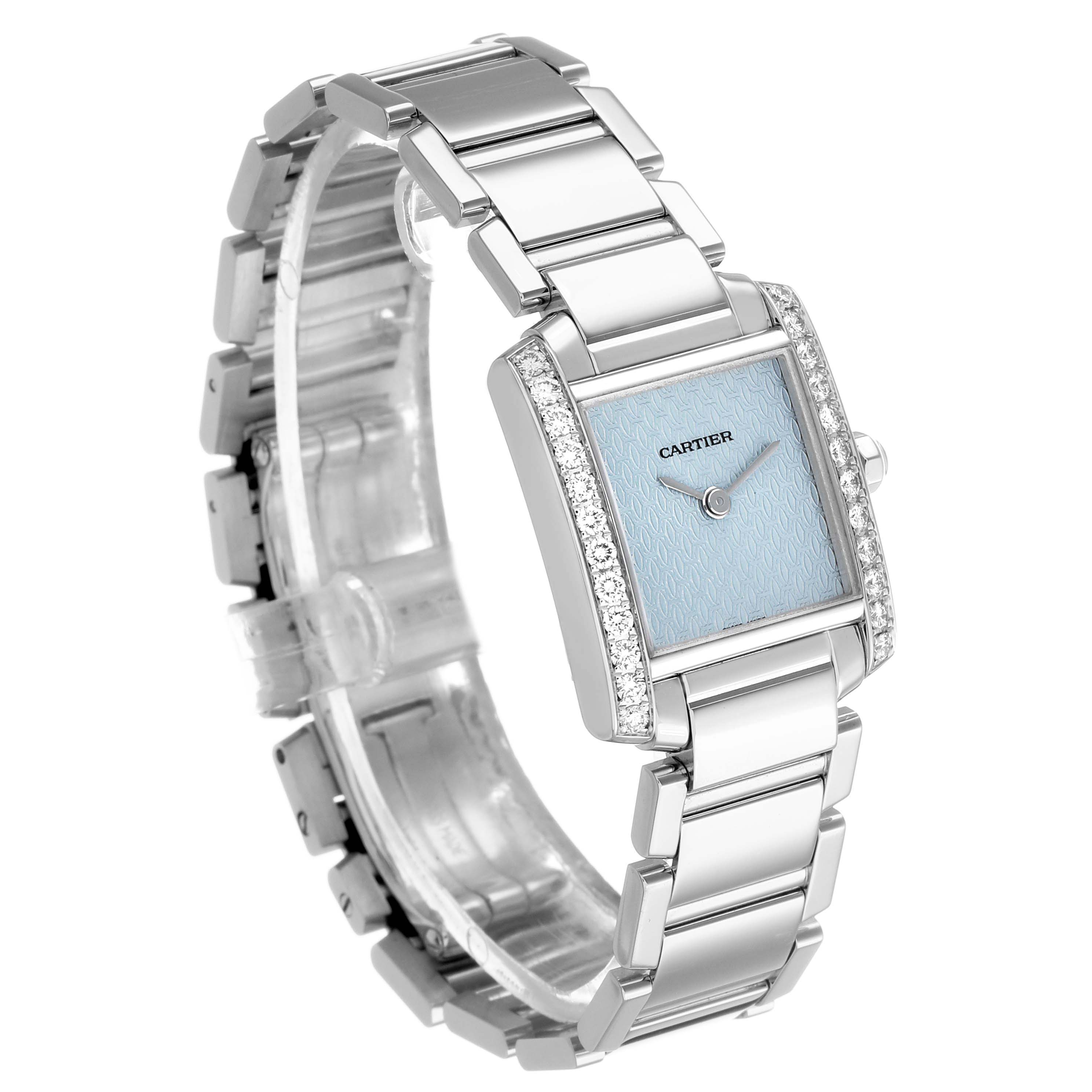 The Cartier Tank Francaise WE1019S3 Women's White Gold Blue Dial watch is shown at a three-quarter angle, highlighting its bracelet and blue dial with diamond accents.