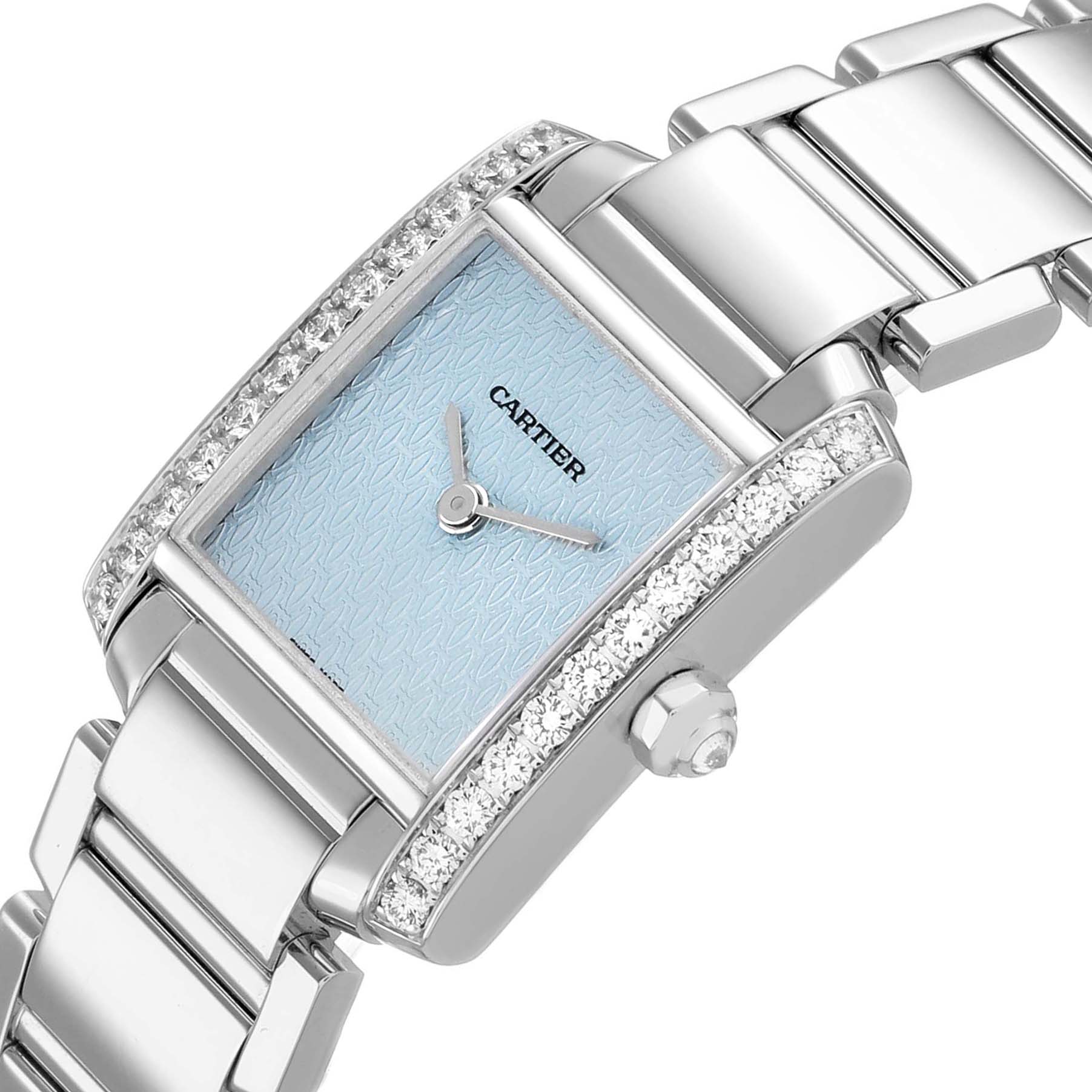 The Cartier Tank Francaise WE1019S3 Women's White Gold Blue Dial watch is shown at an angled view, highlighting its diamond-encrusted bezel, blue dial, and metal bracelet.