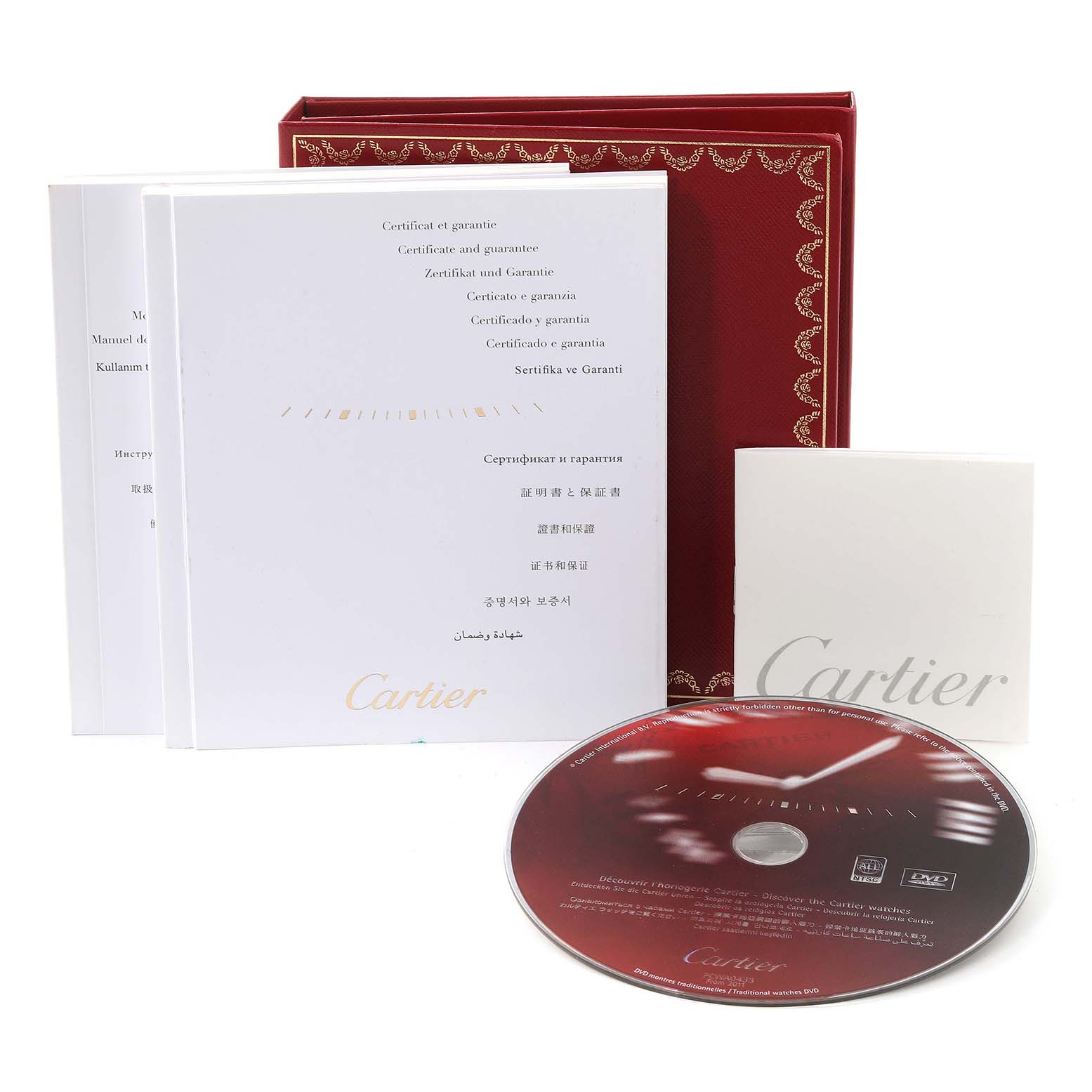 The image shows the Cartier Tank Louis W1529756 Men
s Yellow Gold Silver Dial W1529756 Men
s Yellow Gold Silver Dial model
s packaging, including a red box, booklets, and a DVD.