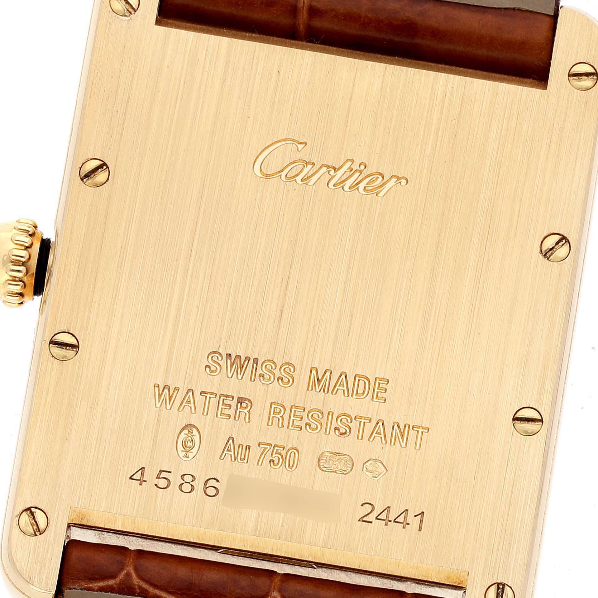 The image shows the backside of the Cartier Tank Louis W1529756 Men
s Yellow Gold Silver Dial W1529756 Men
s Yellow Gold Silver Dial watch, highlighting the engravings, crown, and leather strap.