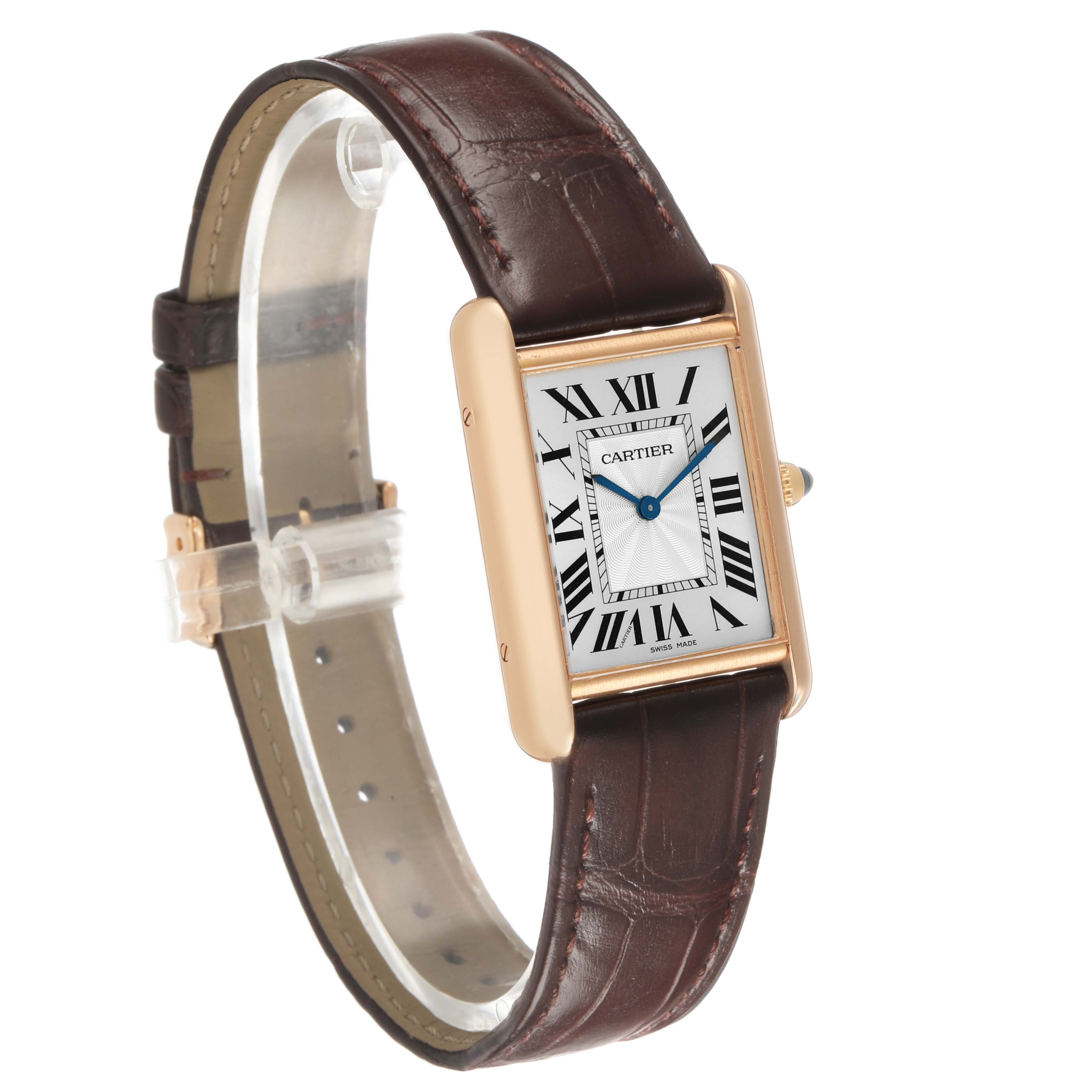 The Cartier Tank Louis WGTA0011 Men's Rose Gold Silver Dial watch is shown from a side angle, highlighting its rectangular face, Roman numerals, and leather strap.