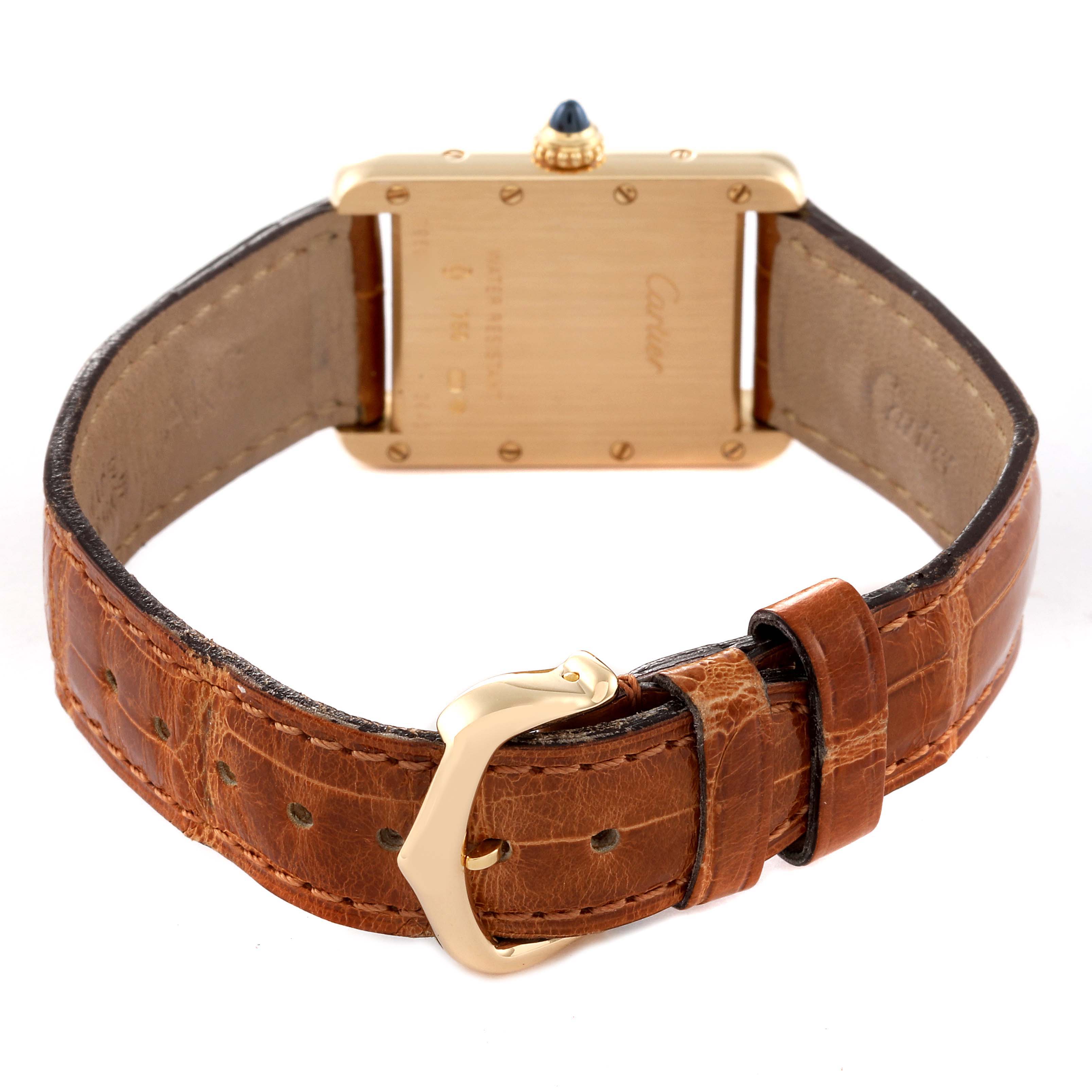 The image shows the back view of a Cartier Tank Louis W1529856 Women's Yellow Gold Silver Dial W1529856 Women's Yellow Gold Silver Dial watch, featuring the case back, crown, and leather strap with a buckle.