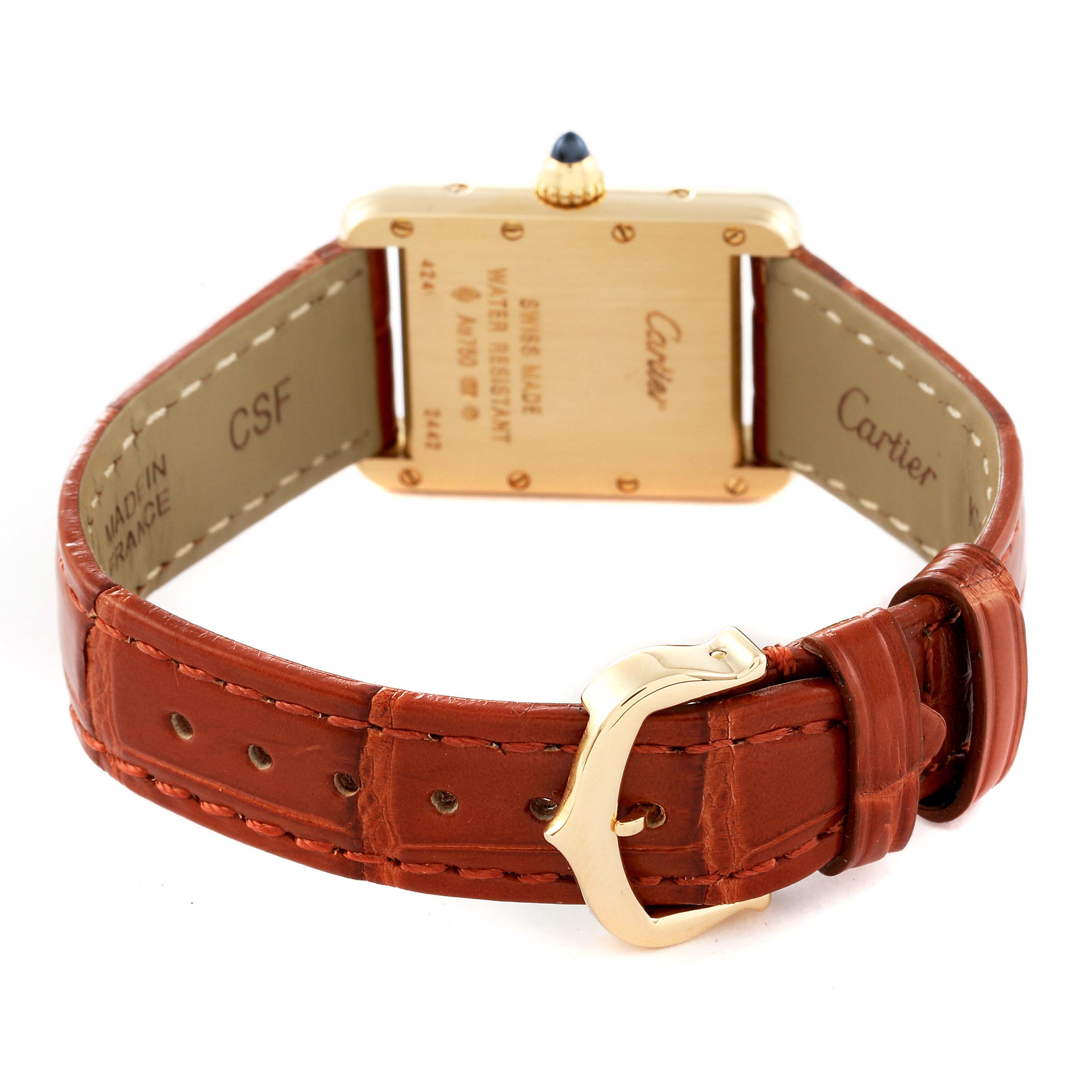 This image shows the back of the Tank Louis Cartier watch with a leather strap and visible buckle.