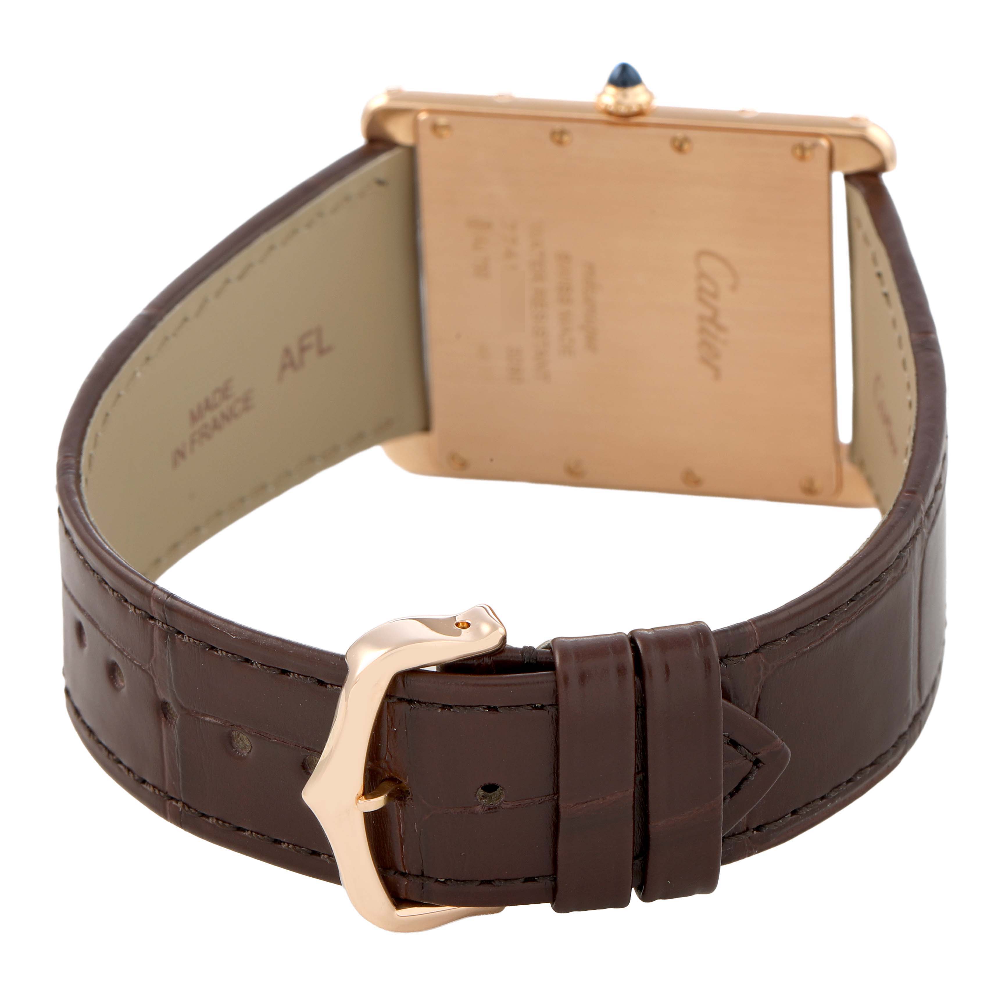 The Cartier Tank Louis W1560017 Men's Rose Gold Silver Dial watch is shown from the back, highlighting the gold case, leather strap, and buckle.