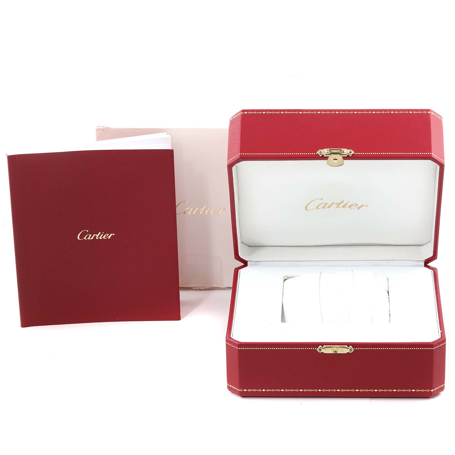 This image shows the packaging for a Cartier Tank Solo W5200025 Men
s Rose Gold Silver Dial W5200025 Men
s Rose Gold Silver Dial watch, including the red box, manual, and soft protective case insert.