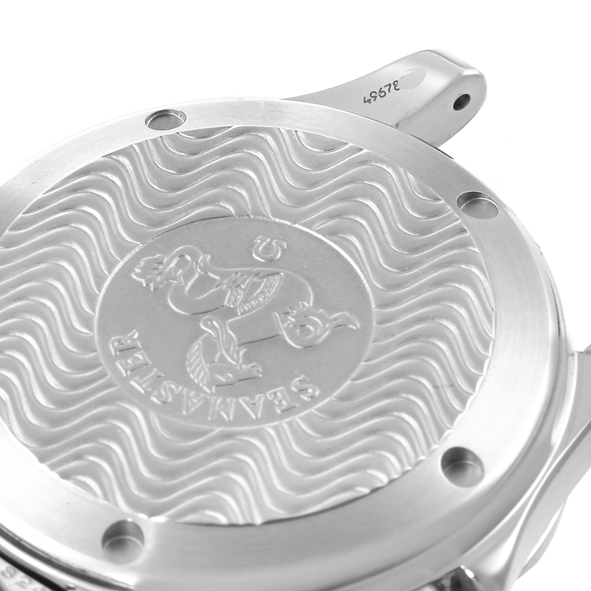 Close-up of the back of an Omega Seamaster 2551.80.00 Men
s Stainless Steel Blue Dial 2551.80.00 Men
s Stainless Steel Blue Dial watch, displaying the engraved logo and wave pattern.