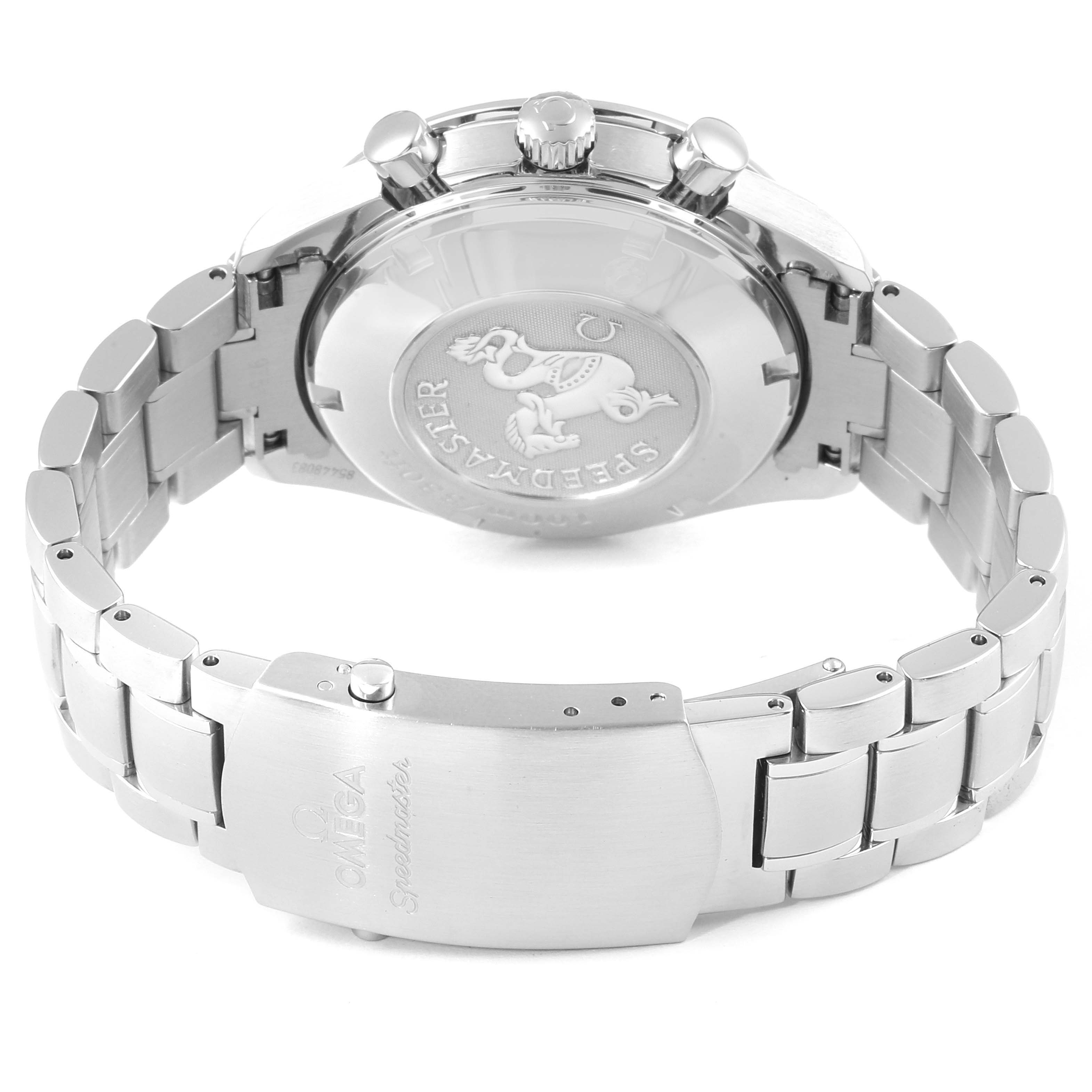 The image shows the back and clasp of an Omega Speedmaster 3210.52.00 Men
s Stainless Steel Black Dial 3210.52.00 Men
s Stainless Steel Black Dial watch, highlighting its stainless steel bracelet and engraved case back.