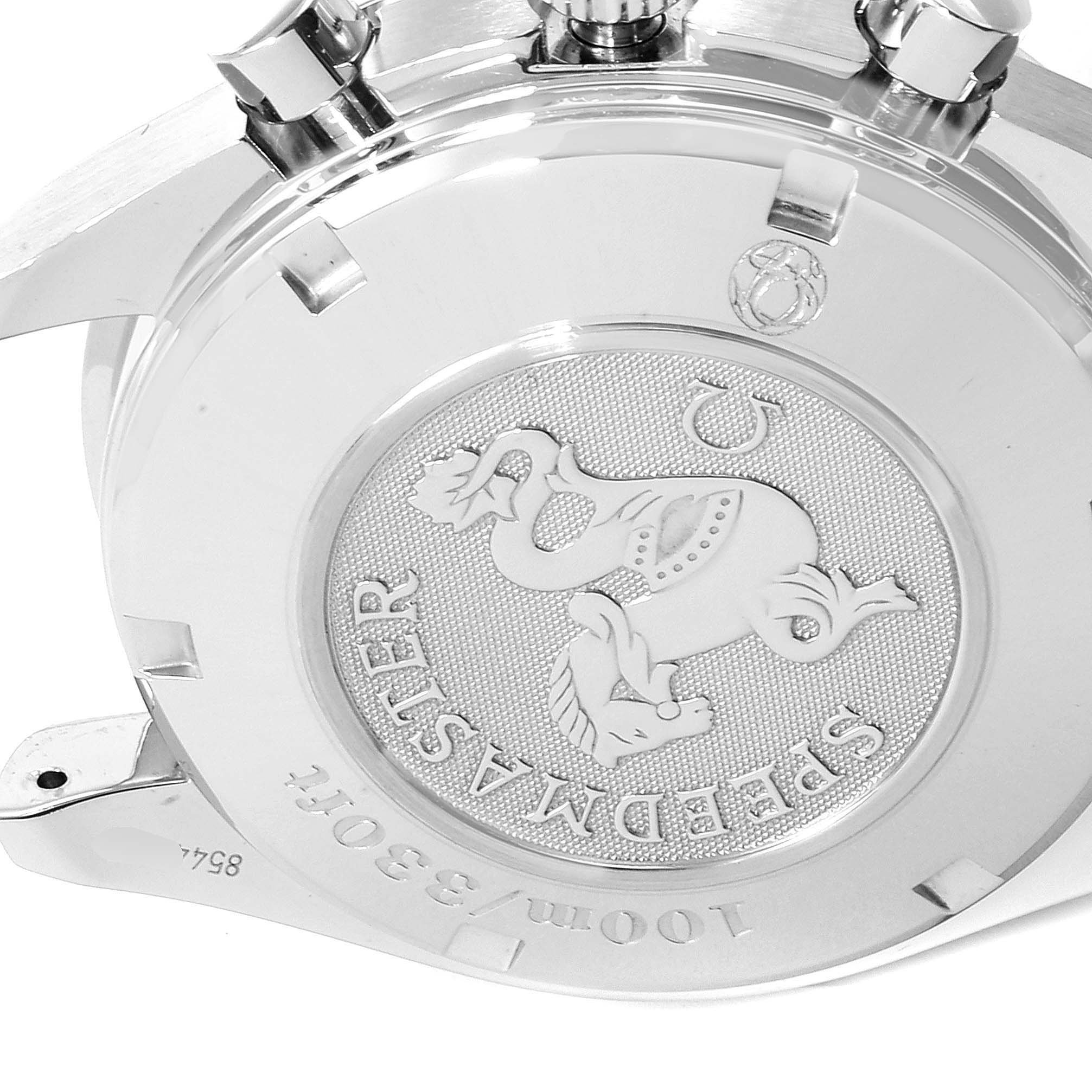 The image shows the back case and pushers of an Omega Speedmaster 3210.52.00 Men
s Stainless Steel Black Dial 3210.52.00 Men
s Stainless Steel Black Dial watch.