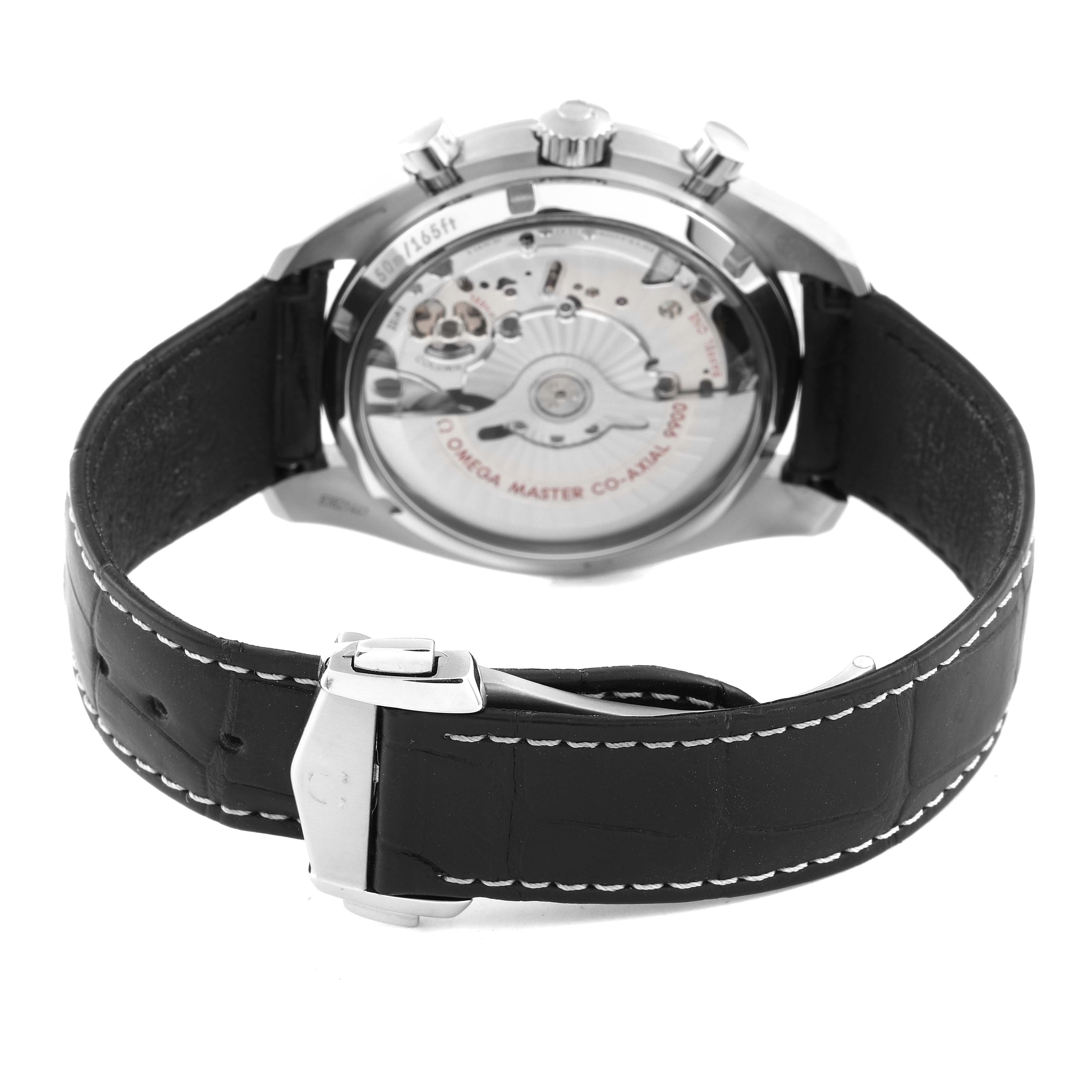 The image shows the back view of an Omega Speedmaster 329.33.44.51.04.001 Men's Stainless Steel Silver Dial 329.33.44.51.04.001 Men's Stainless Steel Silver Dial watch, displaying its mechanical movement and black leather strap.