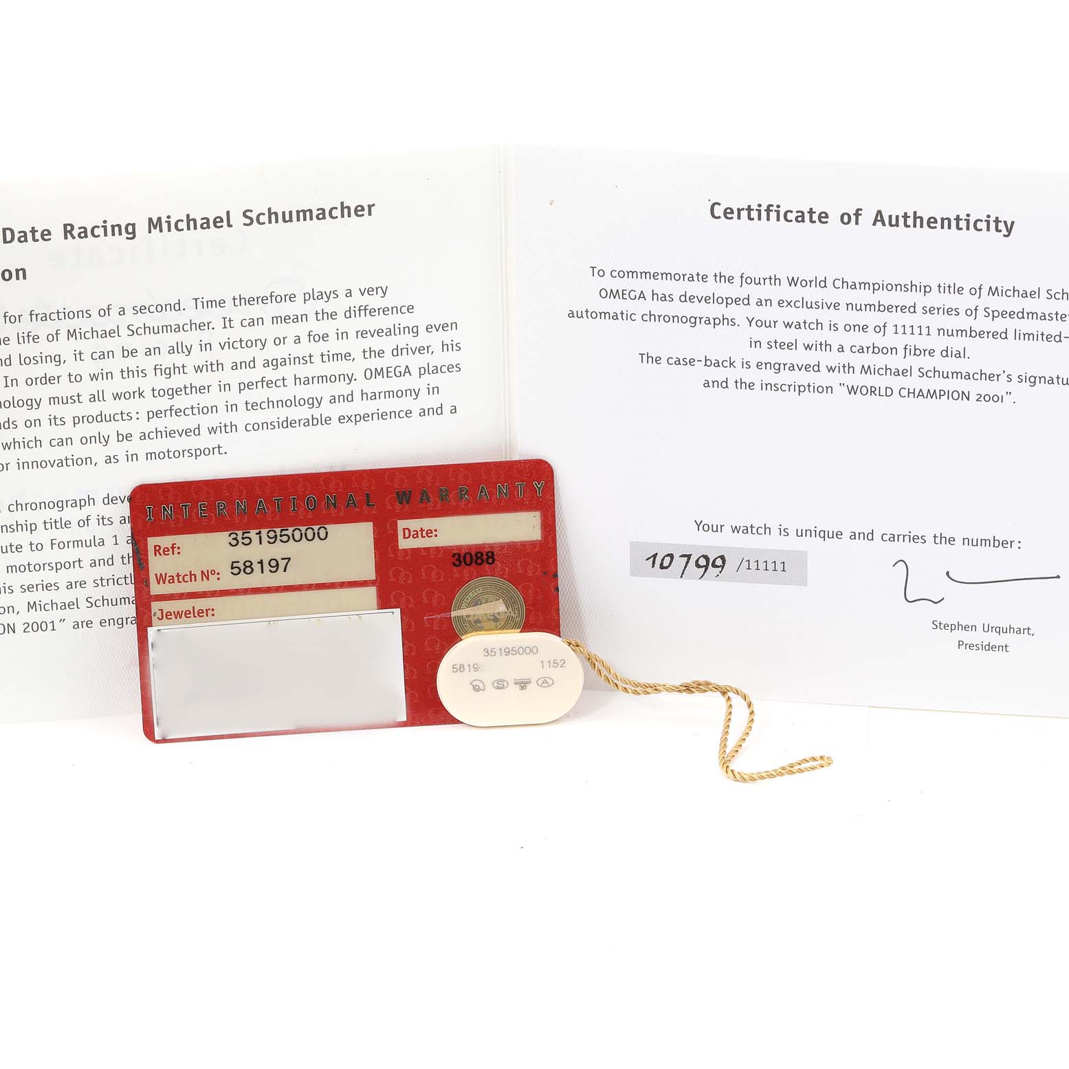 The image shows the international warranty card and certificate of authenticity for the Omega Speedmaster 3519.50.00 Men's Stainless Steel Black Dial 3519.50.00 Men's Stainless Steel Black Dial model, angled flatly.