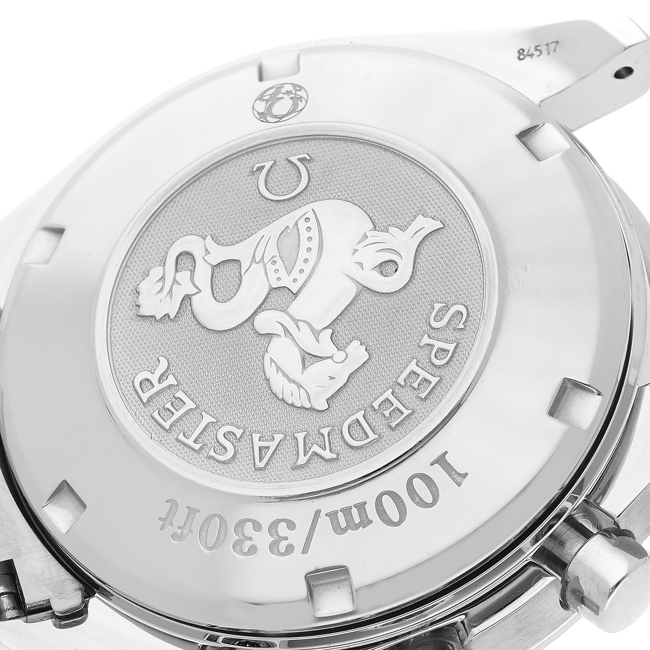 This image shows the case back of the Omega Speedmaster 3211.32.00 Men's Stainless Steel Silver Dial 3211.32.00 Men's Stainless Steel Silver Dial watch, highlighting its logo and water resistance markings.