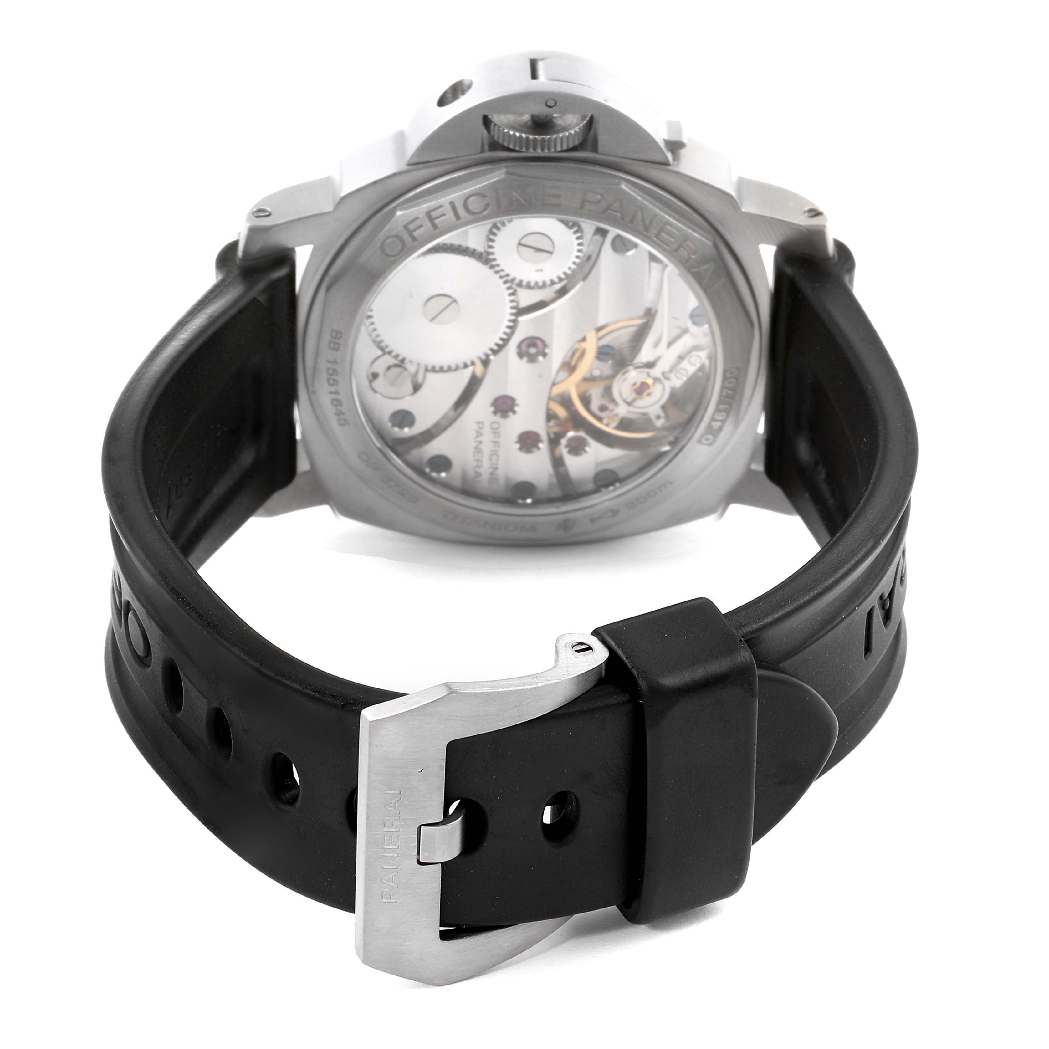 The image shows the back view of a Panerai Luminor PAM00177 Men's Titanium Black Dial PAM00177 Men's Titanium Black Dial watch, highlighting its internal mechanisms and the black rubber strap with a buckle.