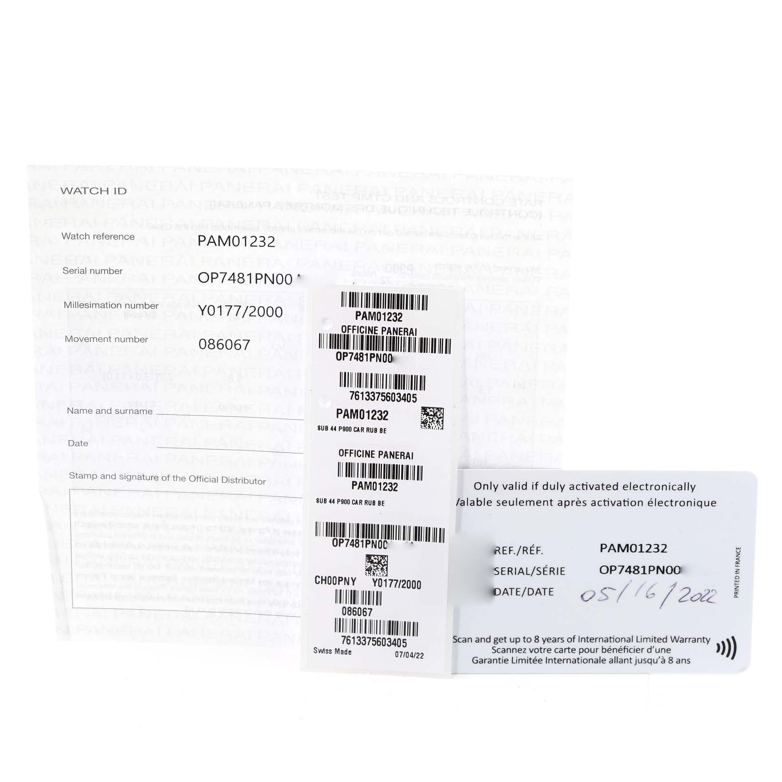 The image shows documentation and tags for a Panerai Submersible PAM01232 Men's Ceramic Blue Dial PAM01232 Men's Ceramic Blue Dial model (PAM01232), including a warranty card, serial number, and tags.