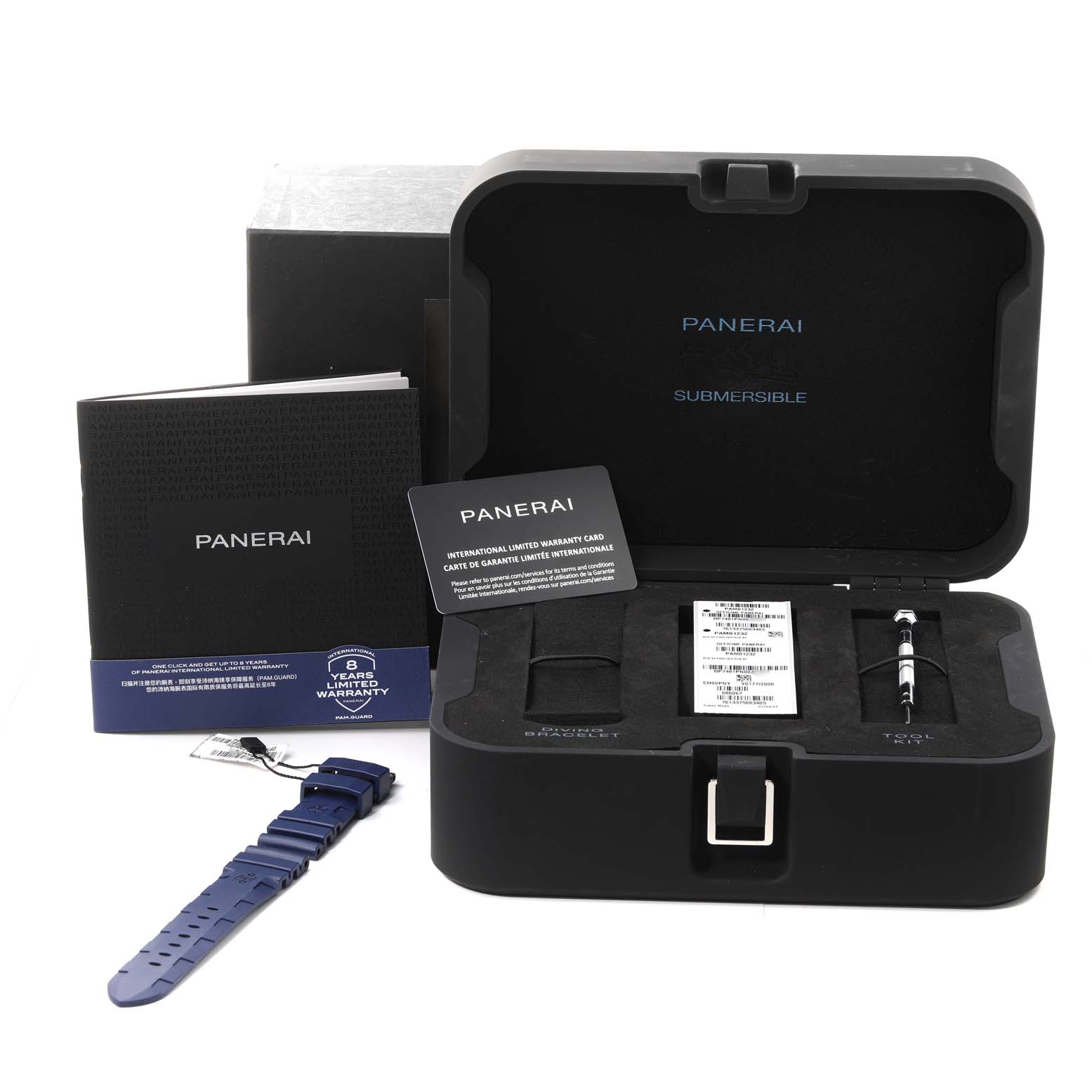 The image shows a Panerai Submersible PAM01232 Men's Ceramic Blue Dial PAM01232 Men's Ceramic Blue Dial watch box with a spare strap, a tool, warranty card, and manuals.
